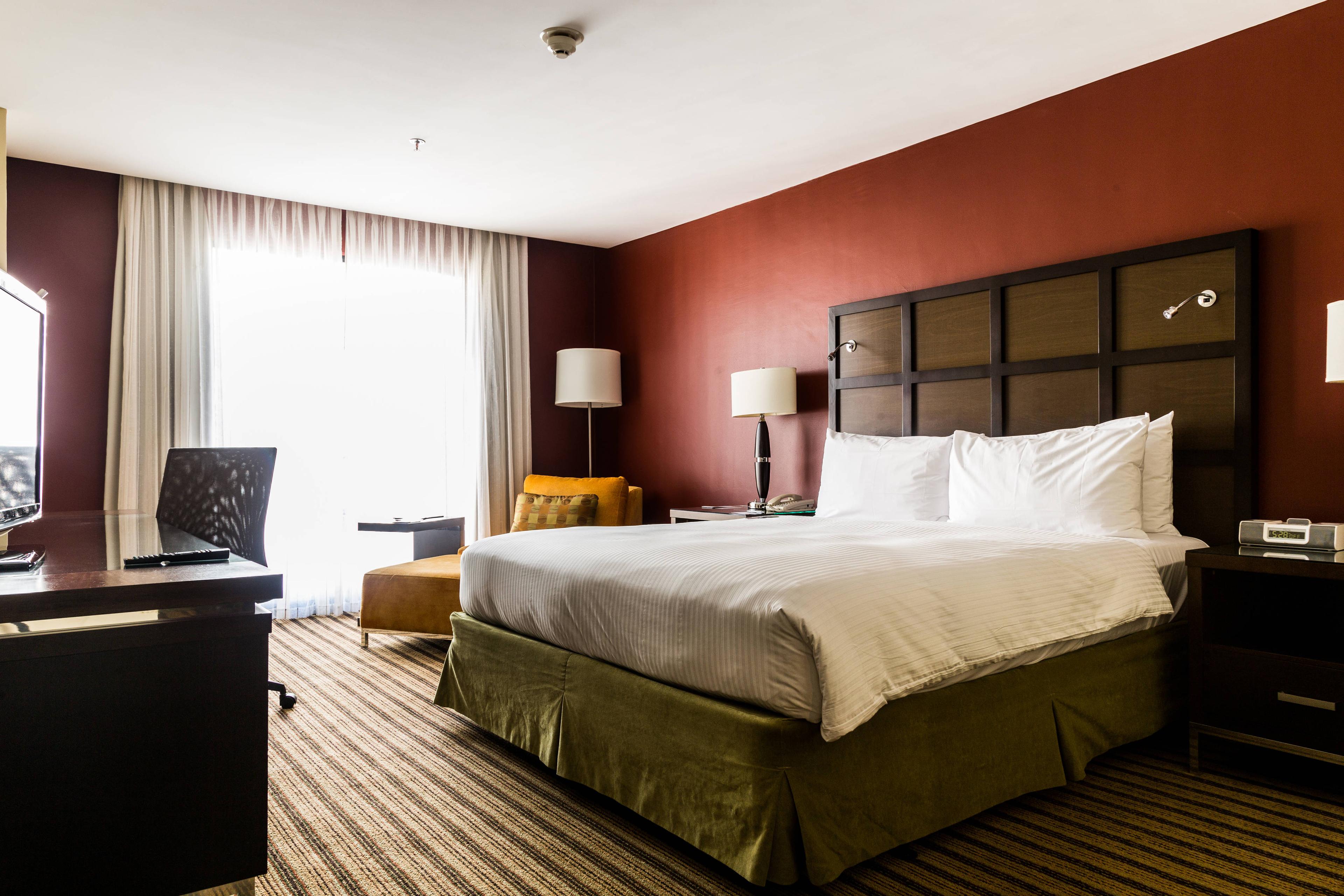 Discover the style and comfort in our spacious rooms with a king-size bed, ultra-luxurious bedding and pillows, a 42-inch LCD TV, iPod dock and high-speed Internet access.