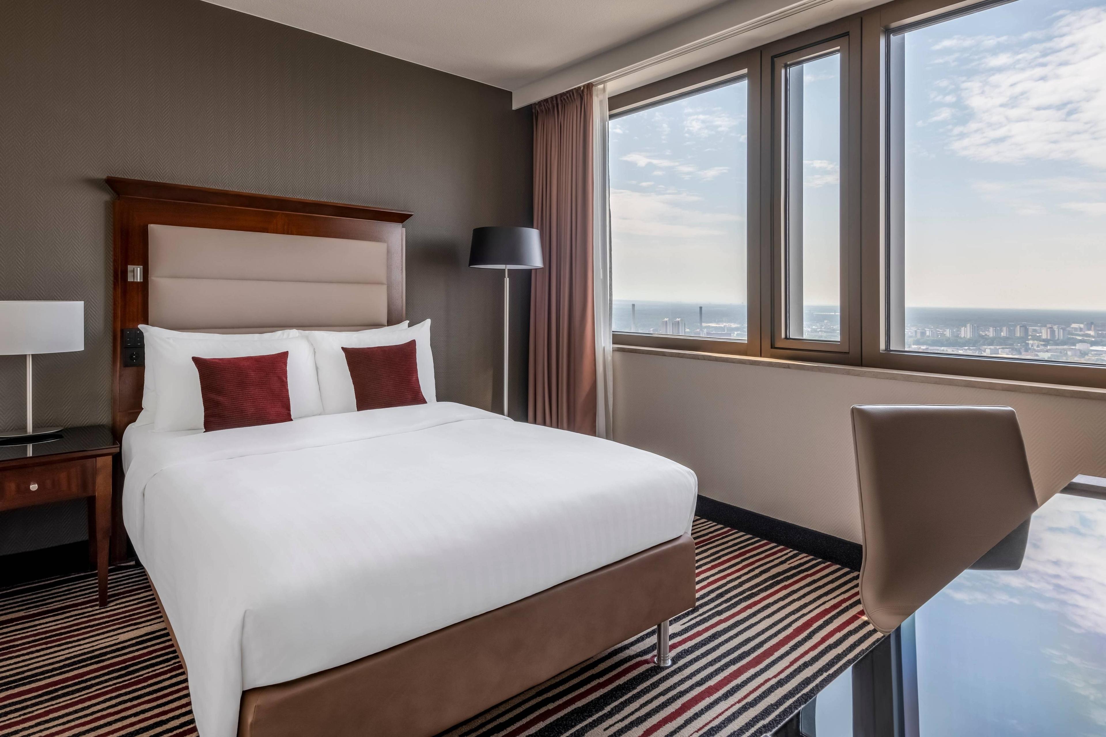 Recharge in our Deluxe Room with Queen Bed.