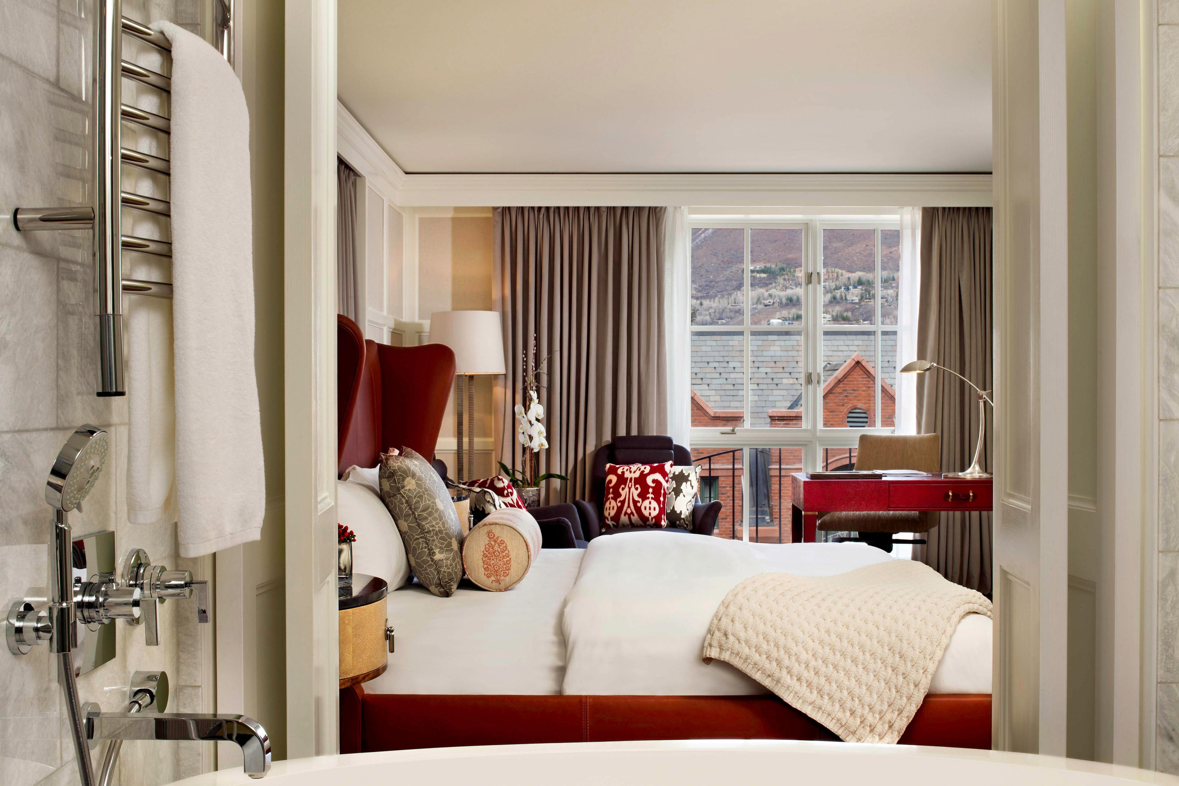 Our expertly designed guest room provides visitors with the amenities they need for a relaxing stay in Aspen, including a luxury king bed with a fluffy duvet, Frette linens and soft blankets.