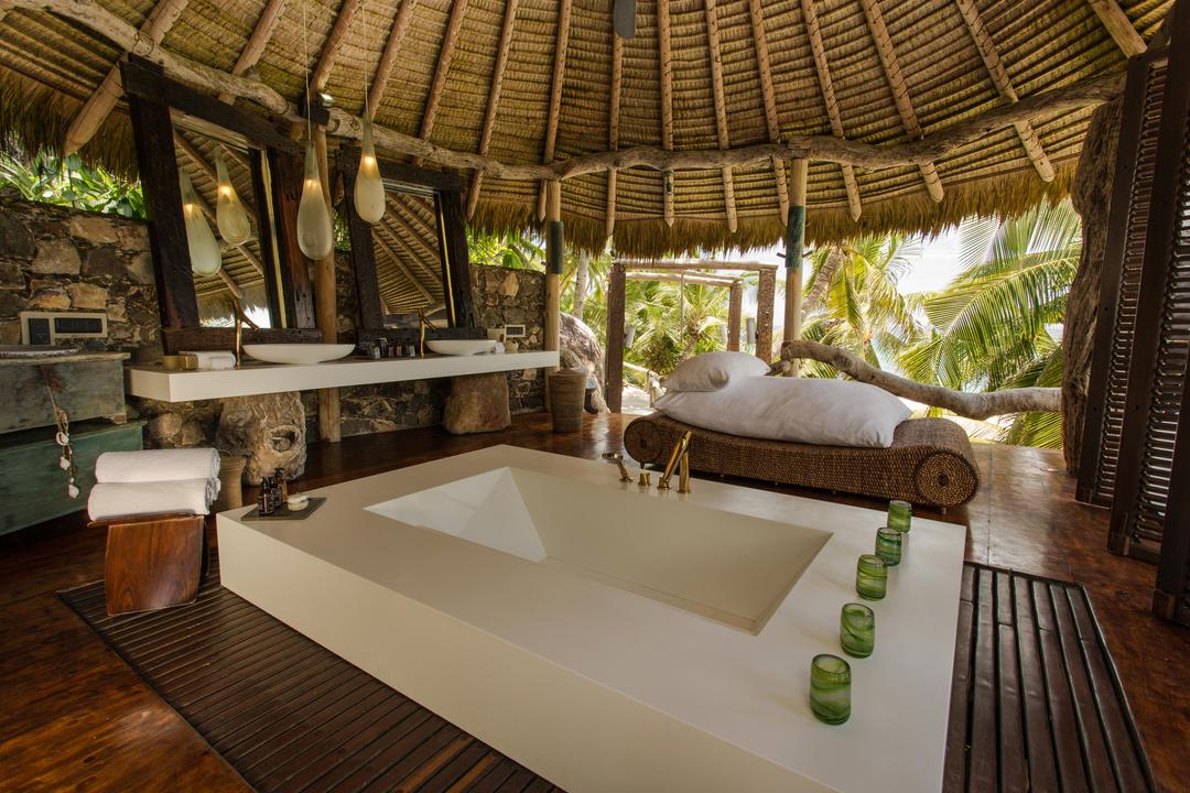 Our luxurious bathrooms boast large baths as well as indoor and outdoor showers - a refreshing way of celebrating nature.