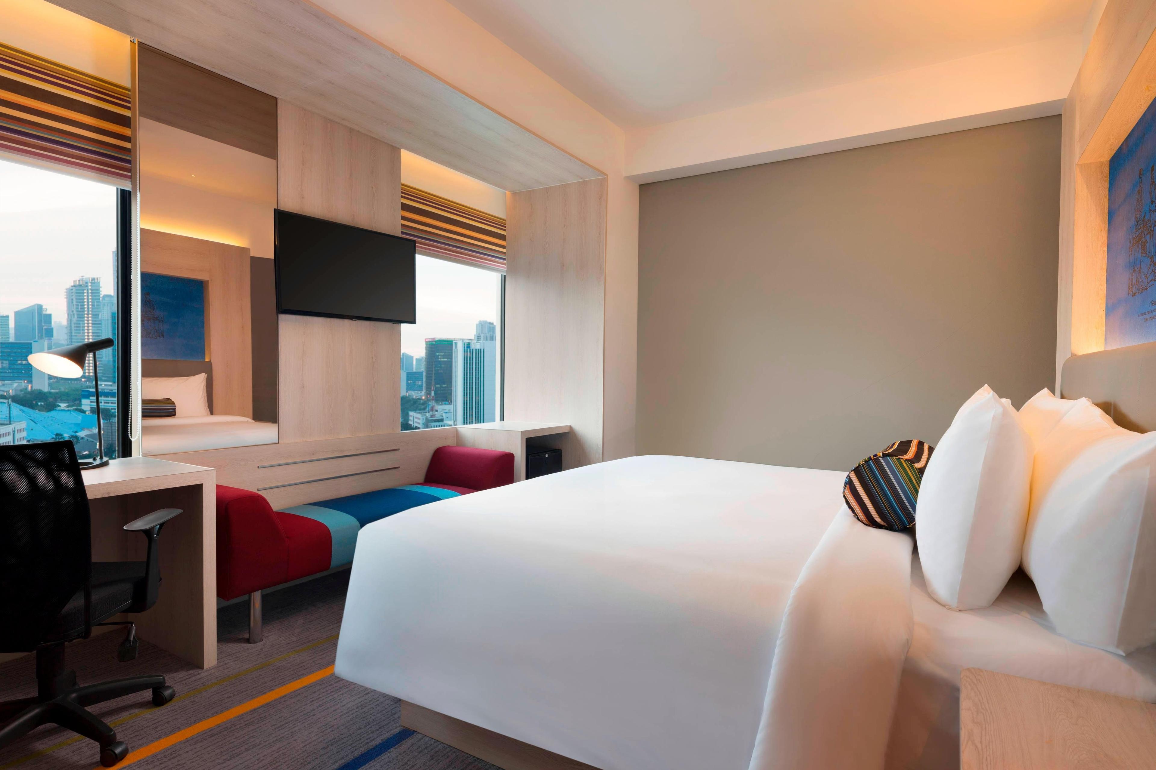 Enjoy panoramic Jakarta views from one of our sleek King Guest Rooms, which includes high-tech amenities like USB outlets and fast free Wi-Fi.