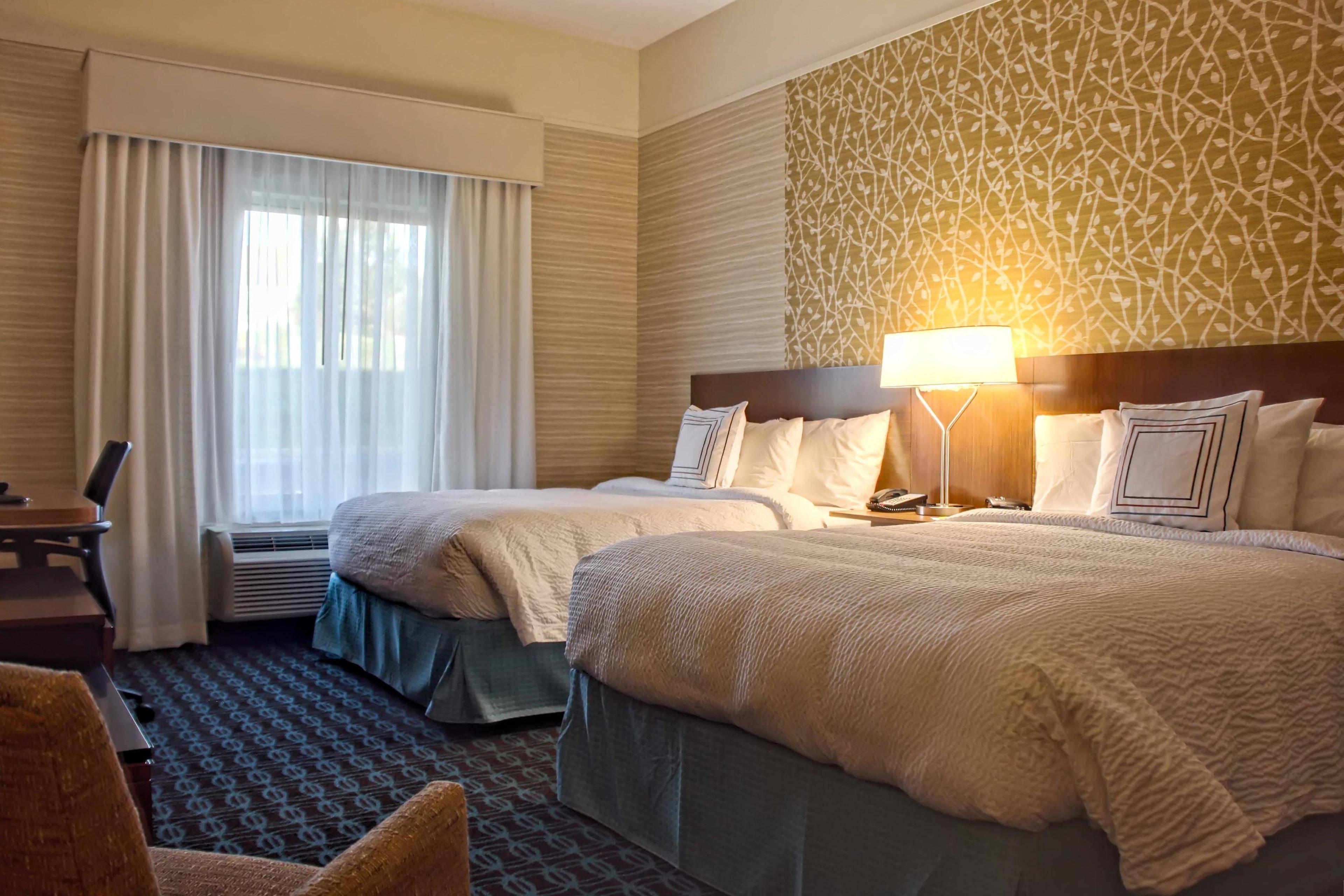 Relax in our spacious queen/queen guest rooms.