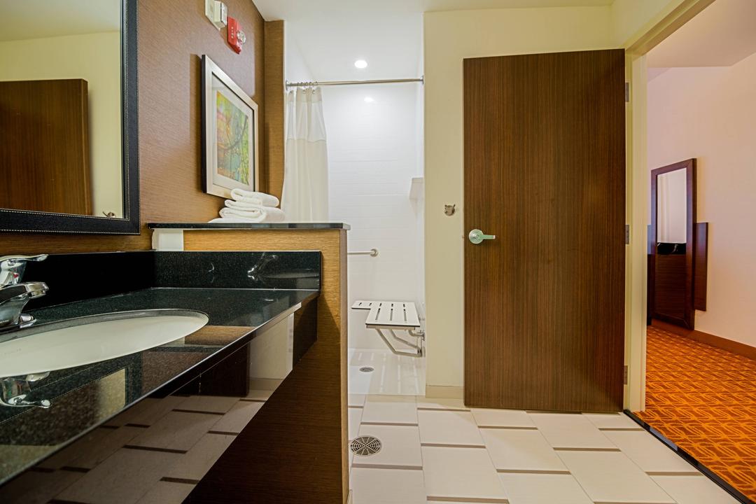 Appreciate our accessible bathrooms with excess counter space and refreshing amenities.