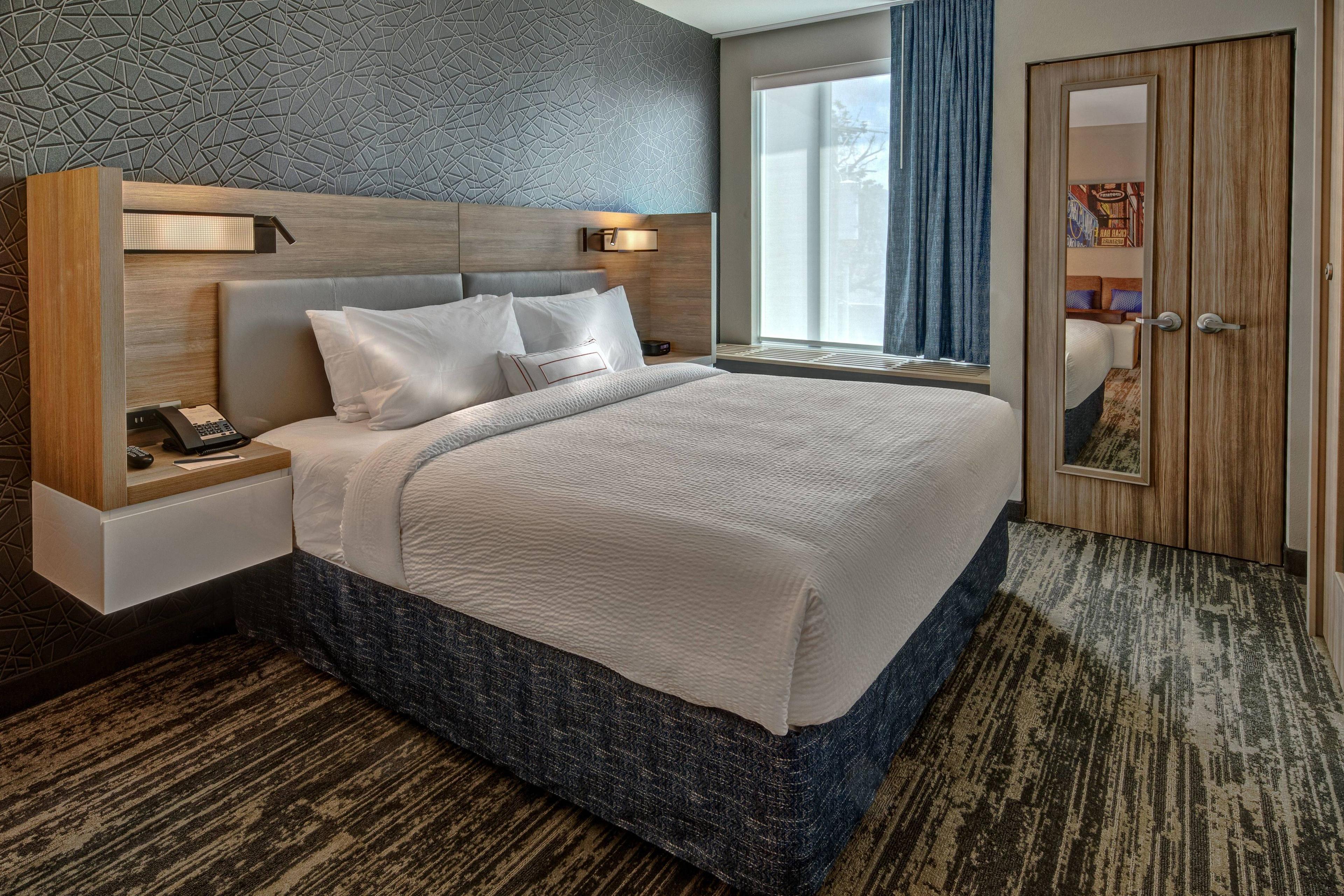 Comfortable and plush bedding in our King Bed Suites