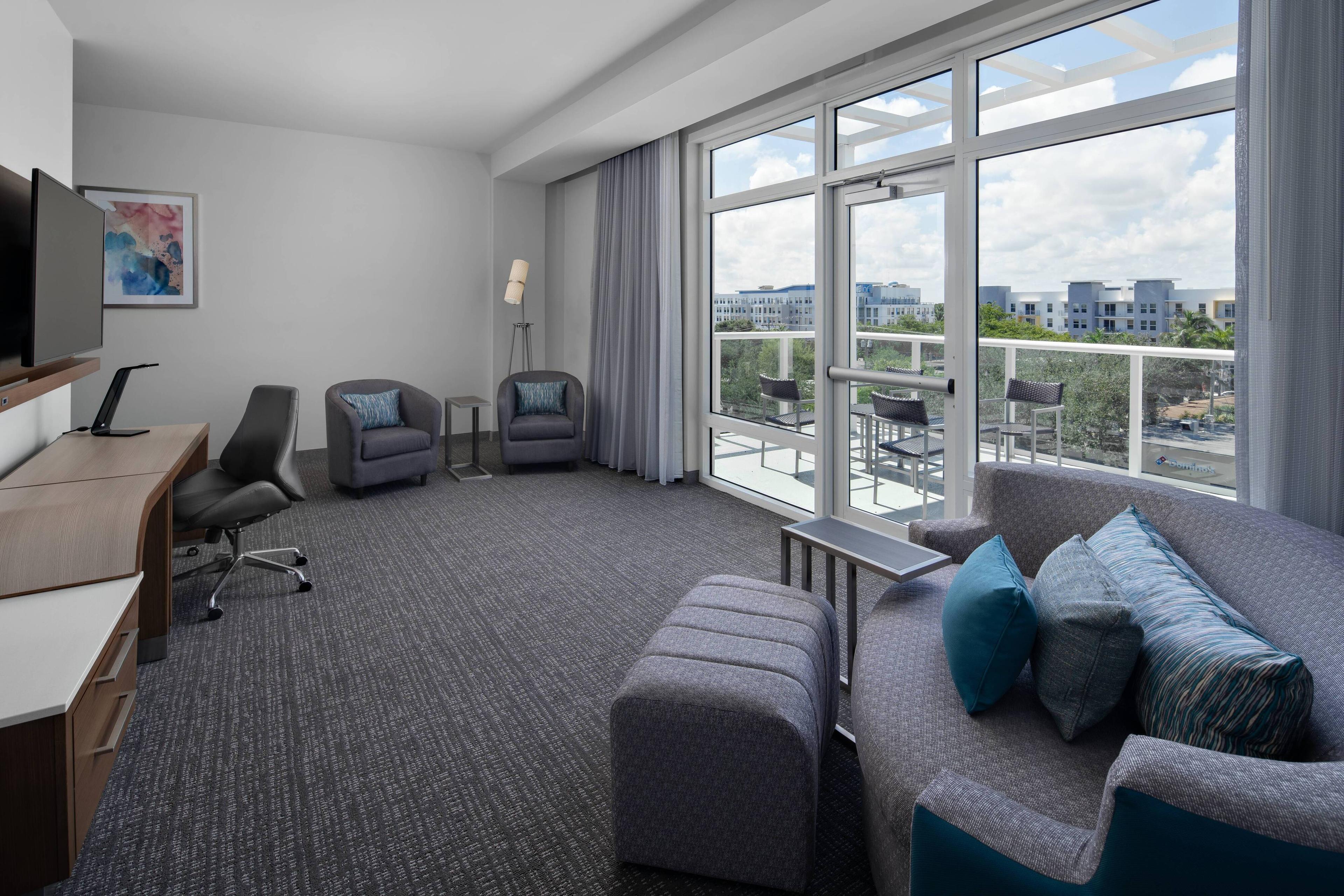Step out onto your balcony for views of Delray Beach from our living room area, equipped with work desk area, television, small refrigerator, sofa bed and complimentary Wi-Fi.