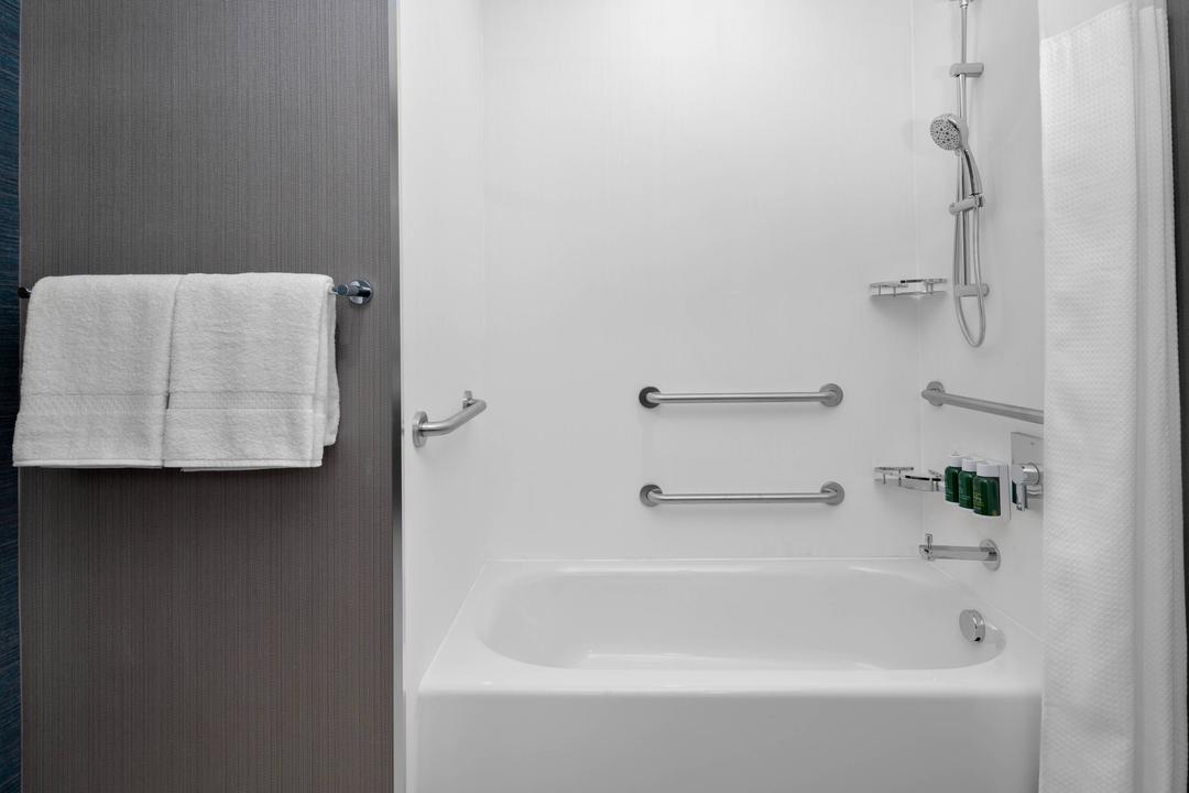 Our ADA compliant tub features thoughtfully placed bars and amenities, making it safe and easy for guests to access