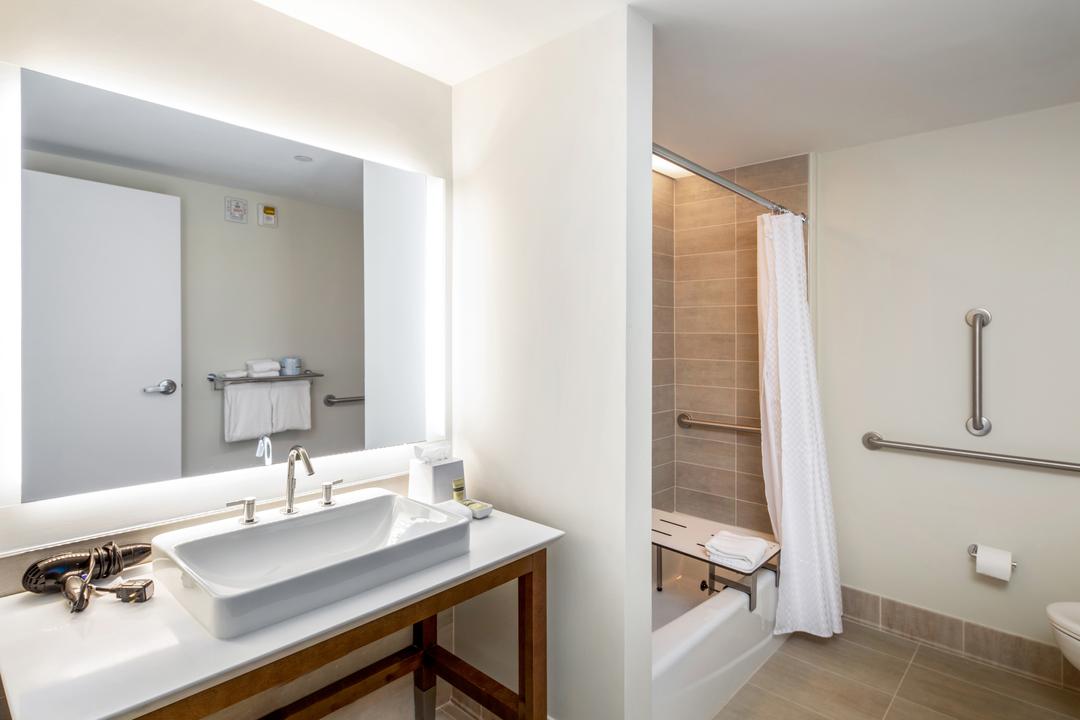 Ask about our rooms with ADA-compliant accessible bathrooms, featuring roll-in showers with benches, adjustable showerheads and grab bars for extra safety.