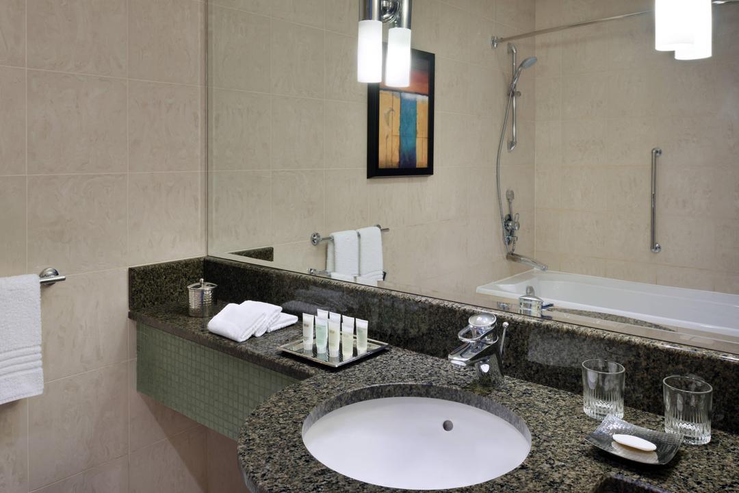 Explore a luxurious and spacious marble bathroom, with full amenities to pamper all.