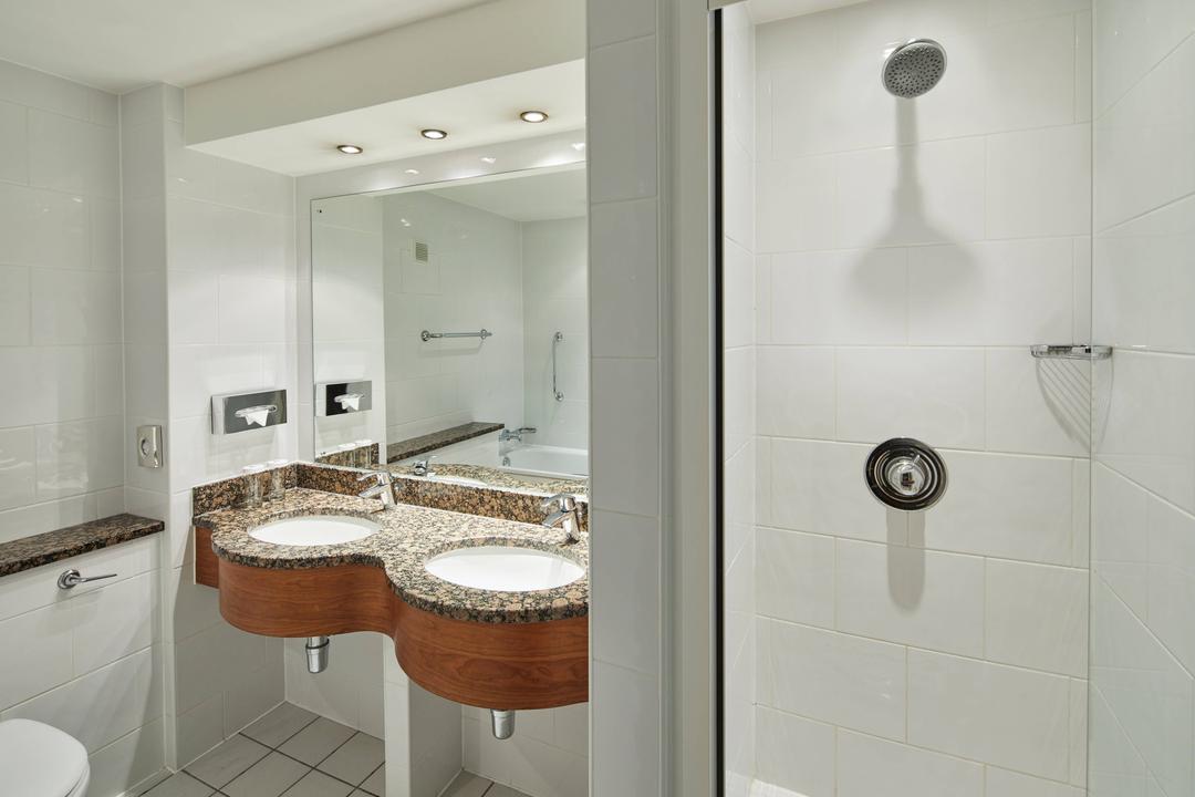 Enjoy a dual sink vanity and premium bath amenities in our junior suite bathroom.
