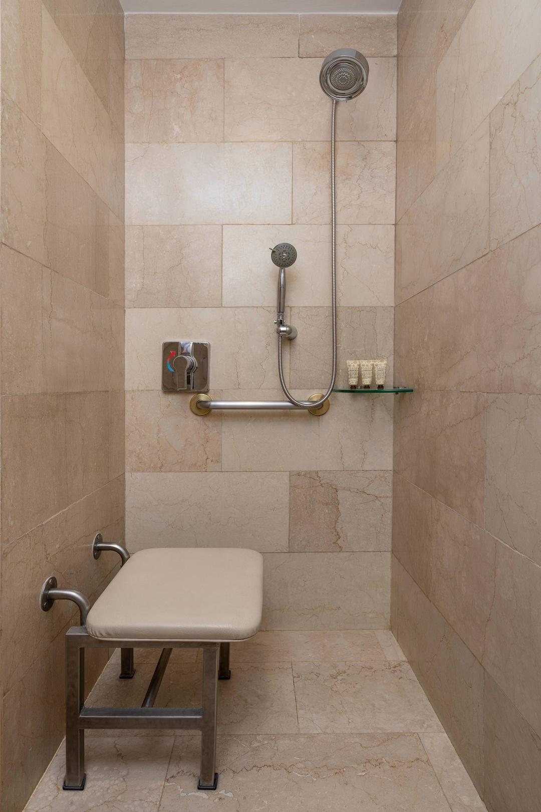 Accessible guest rooms feature showers with bench seats.