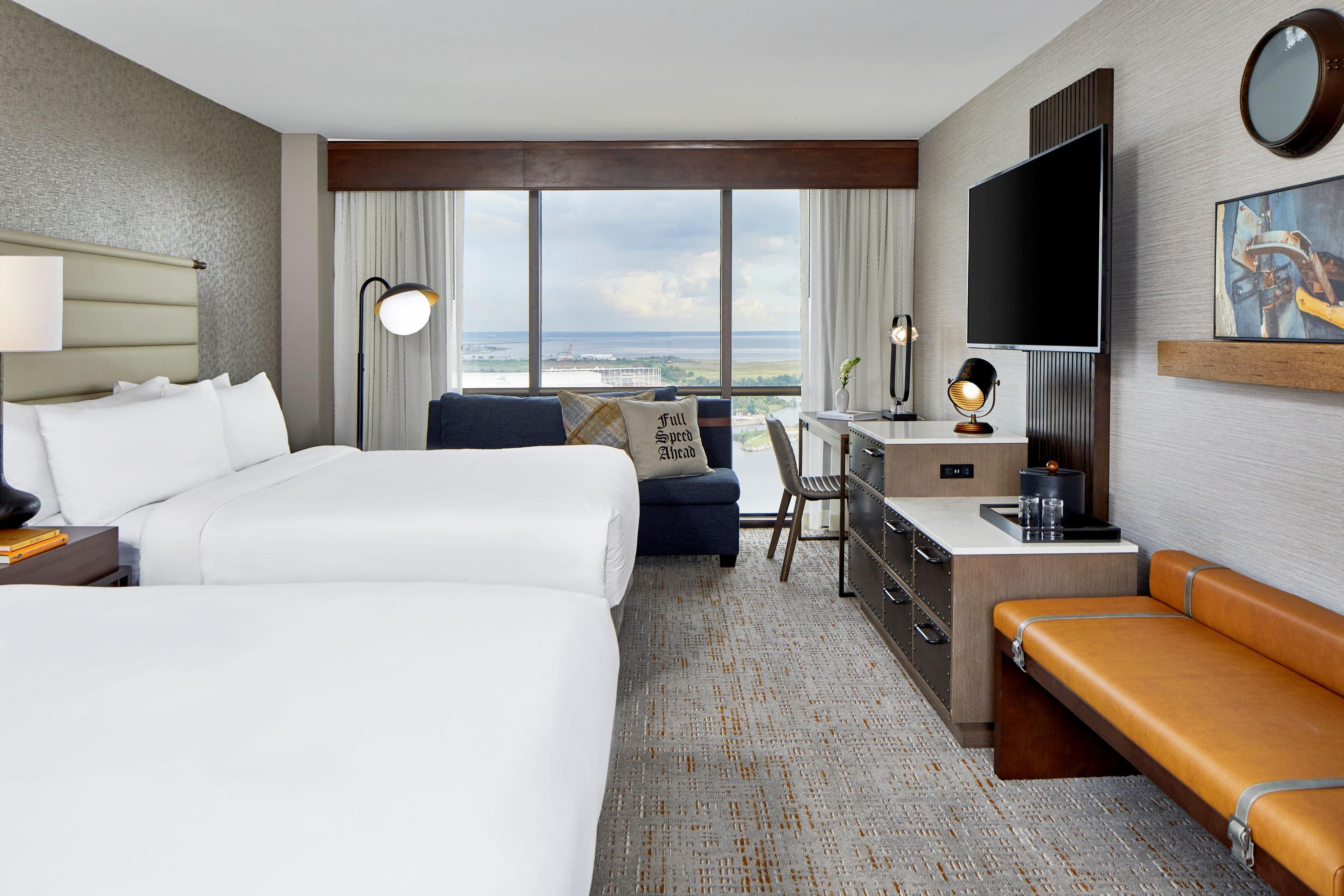 Some of our hotel rooms with two queen beds look out onto Mobile Bay and the Mobile River.