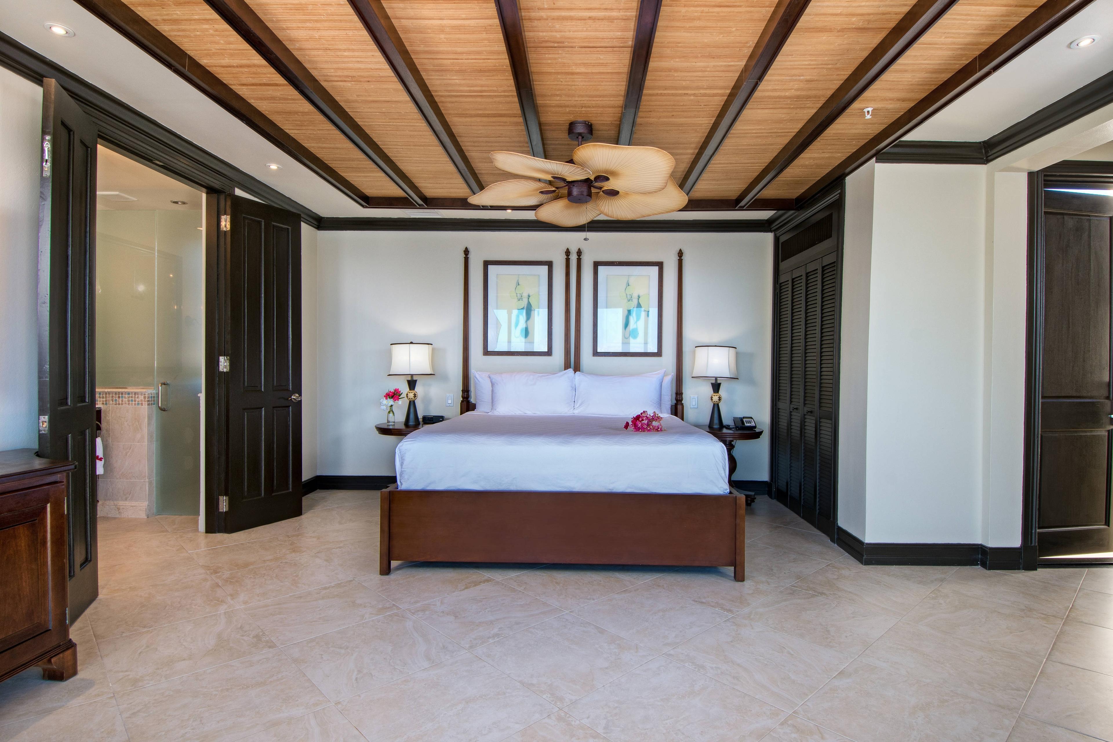 Retreat to your king-size bed for the ultimate escape, featuring en-suite bathrooms and Caribbean-inspired decor.