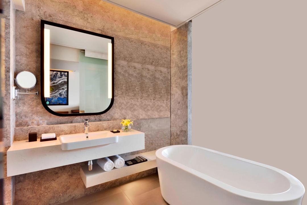 Step straight from the tub into the Indian Ocean or pamper yourself in our hotel’s suite - bathroom which features a sleek, modern design with a stunning stand-up shower.
