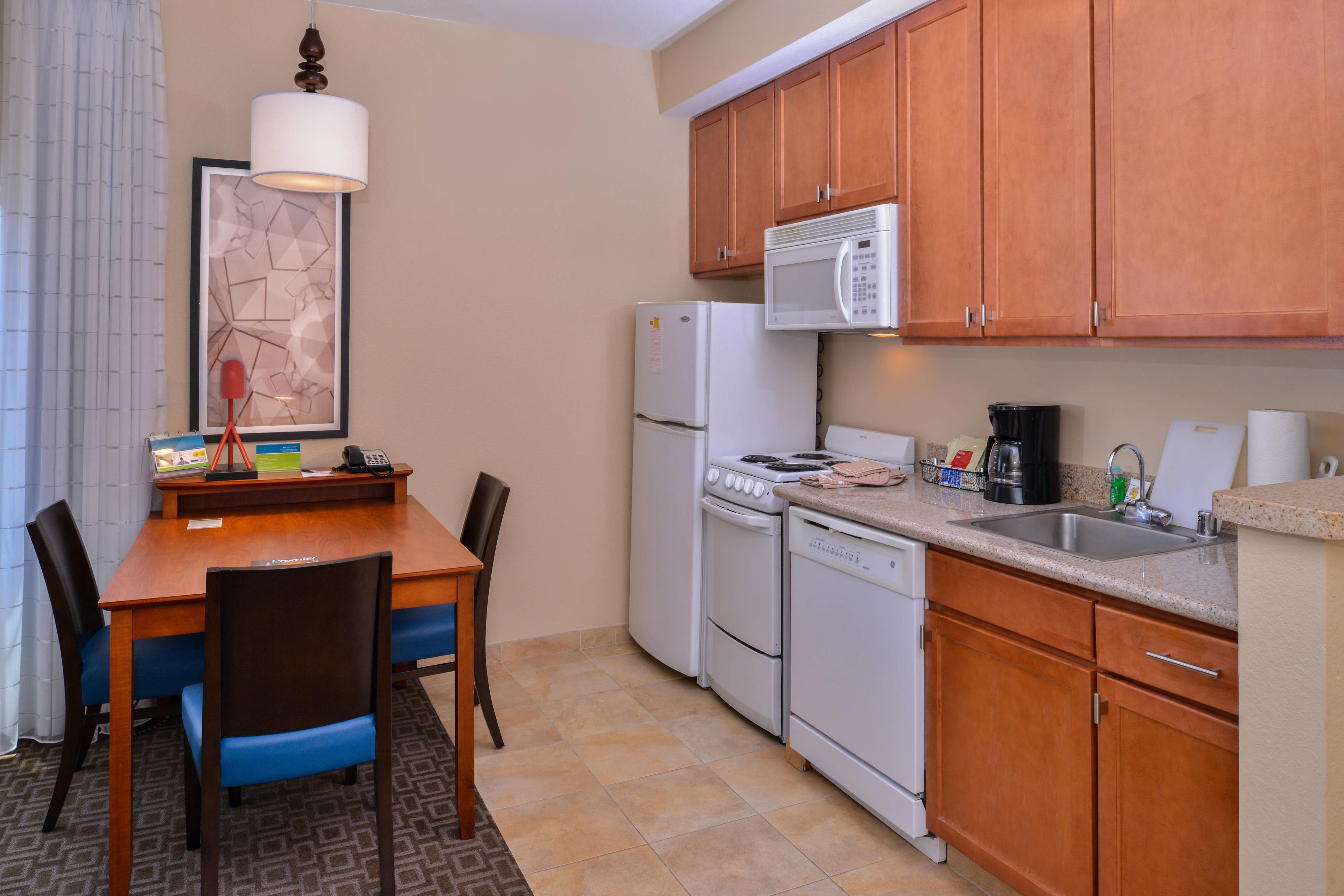 Now you can prepare your favorite meals on the road. Our One-Bedroom Suites come with a full kitchen that includes a full-size refrigerator, microwave, dishwasher, and oven.