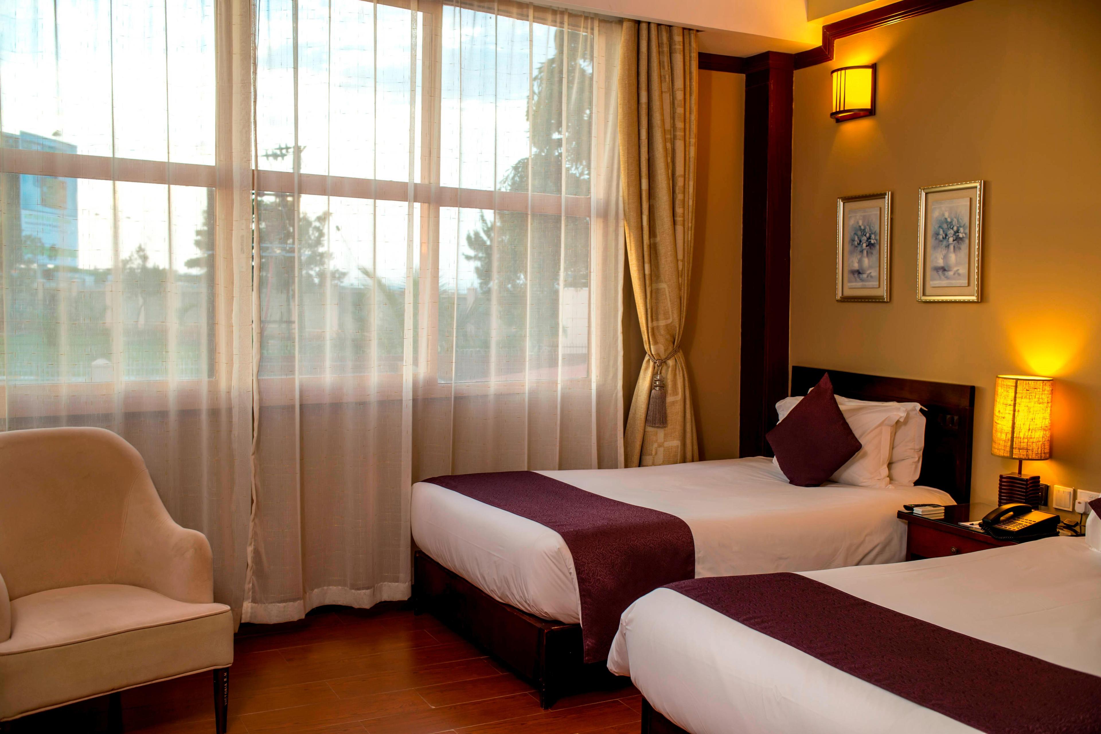 Our Standard twin guest rooms offers a luxurious and spacious stay.
