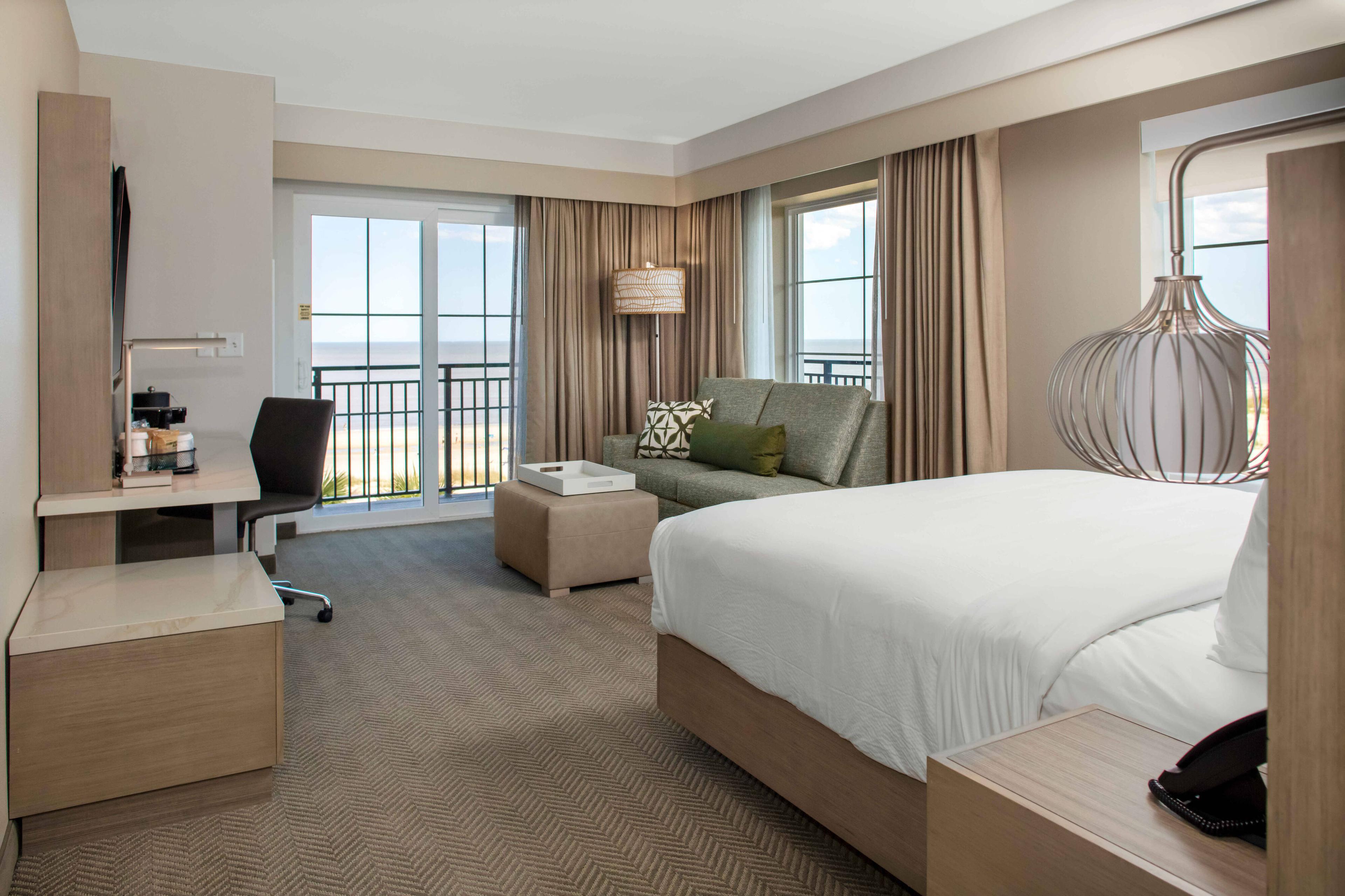 Our premium oceanfront king guest room offers a luxurious king bed and comfortable sitting area.