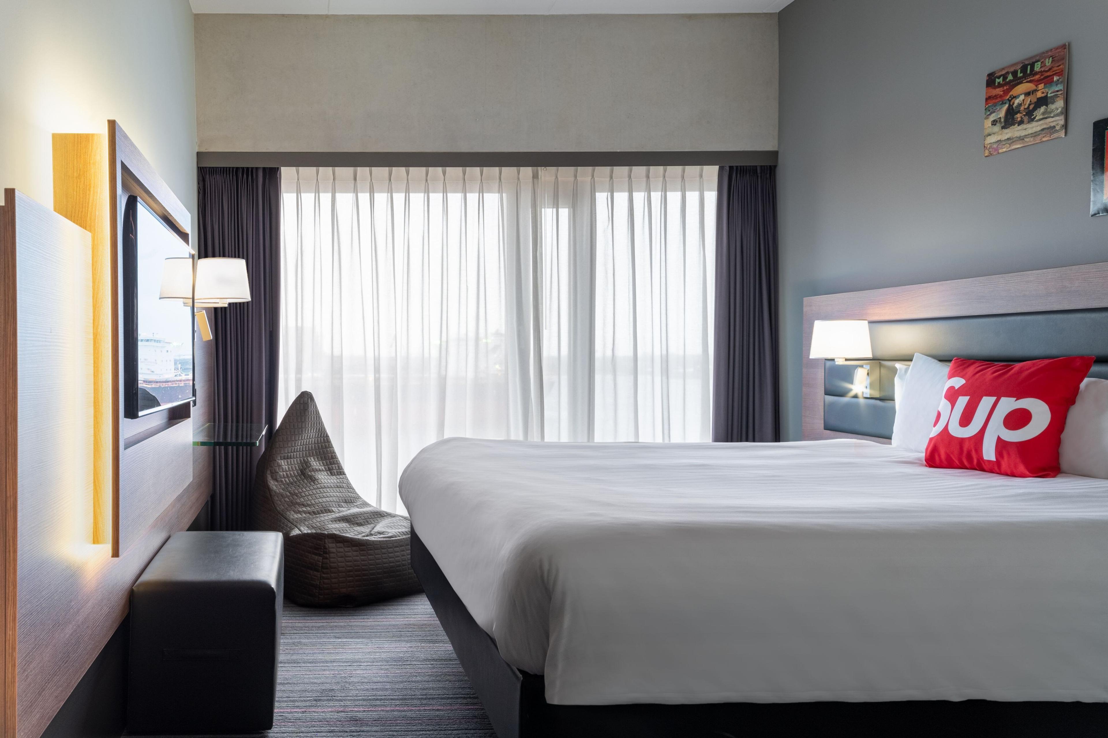 Ultra-modern queen rooms feature a 43-inch smart TV and complimentary, furiously-fast Wi-Fi.