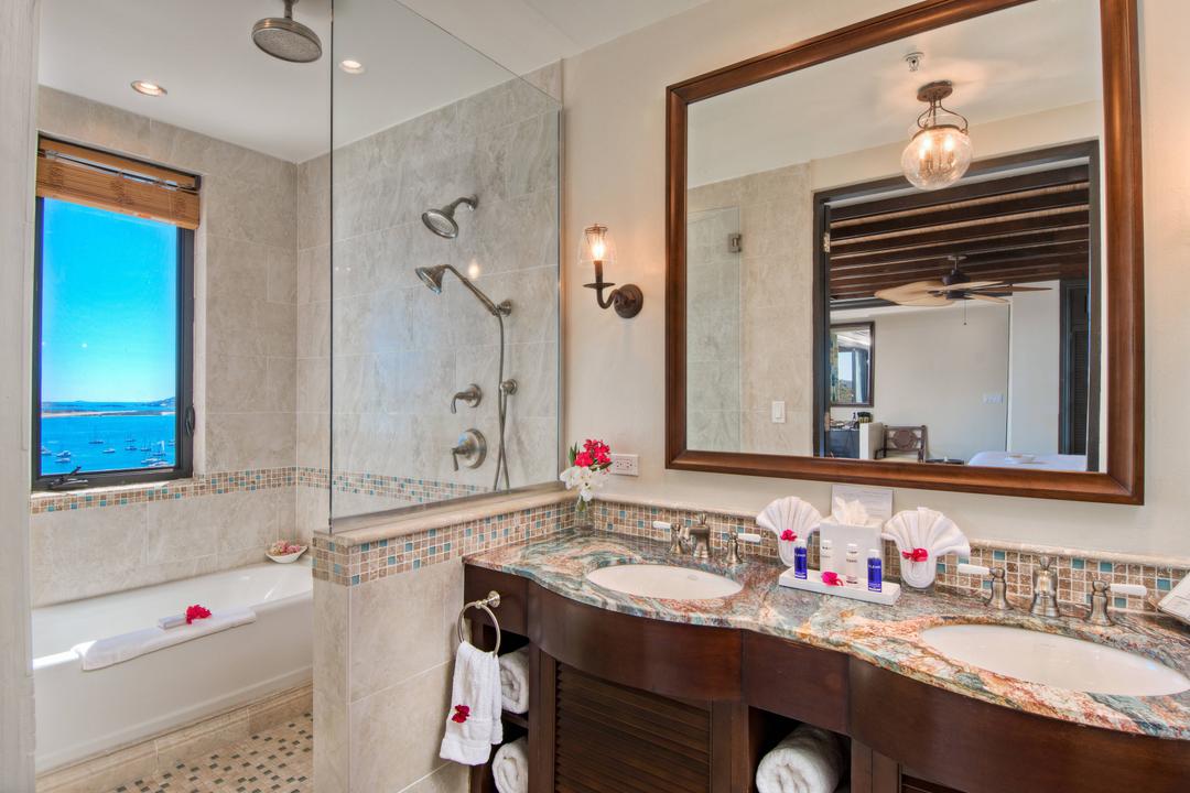 Double-sink vanities with showers and soaking tubs are just the beginning of the luxury when staying on Scrub Island.