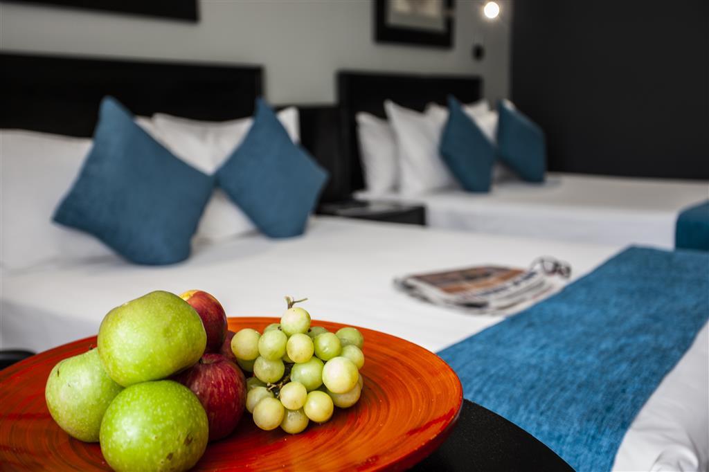 Fruit plate details in Avani Room bedroom with twin beds