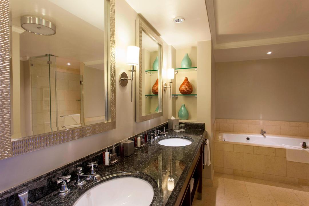 Enjoy the luxury of our expansive double sink vanities with ample lighting, providing couples plenty of space to peacefully begin their day.