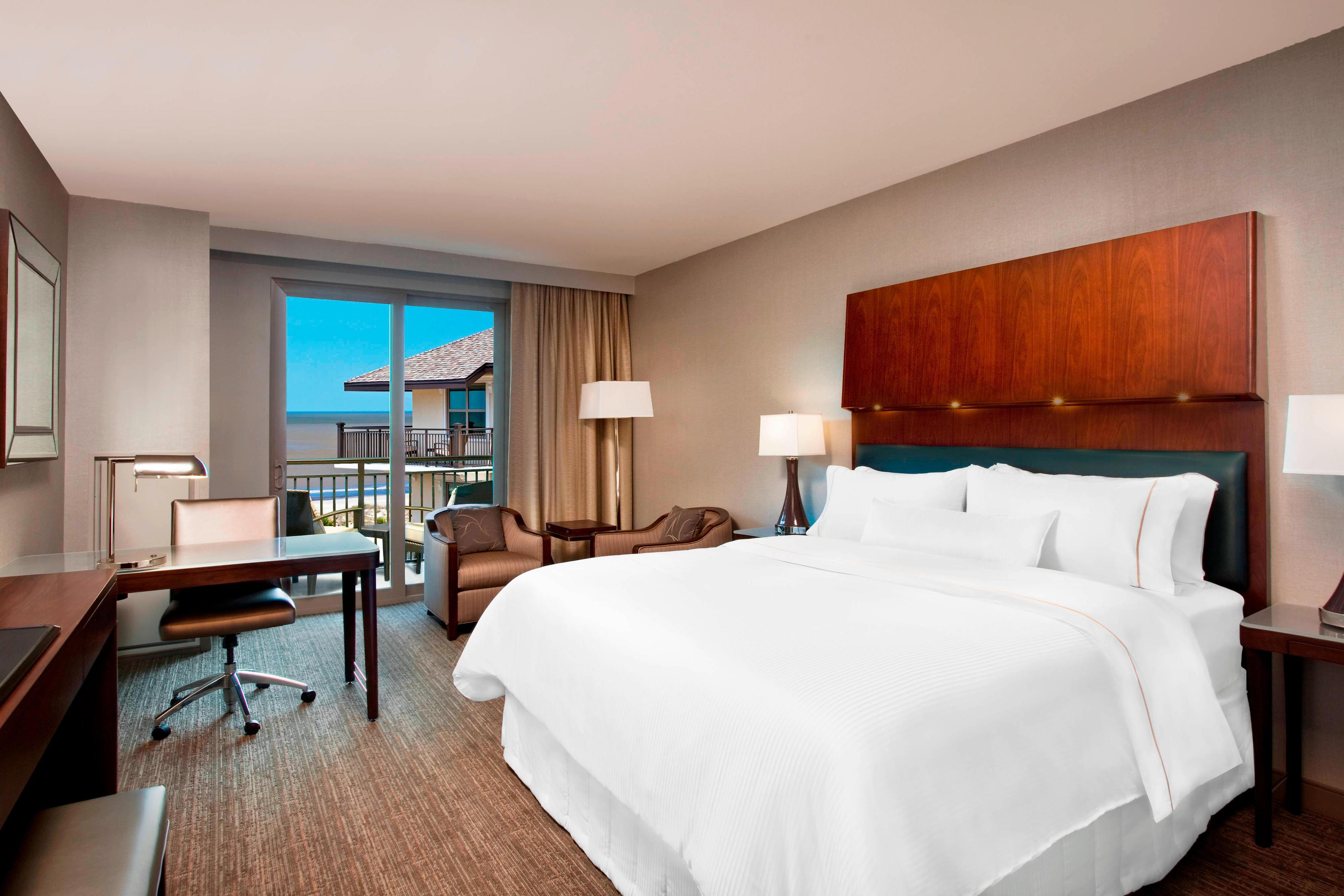Recharge in our grand deluxe room. Get a sound night's sleep on our incredibly soft beds, enjoy the oceanfront views and connect with work using our ergonomic workstations.