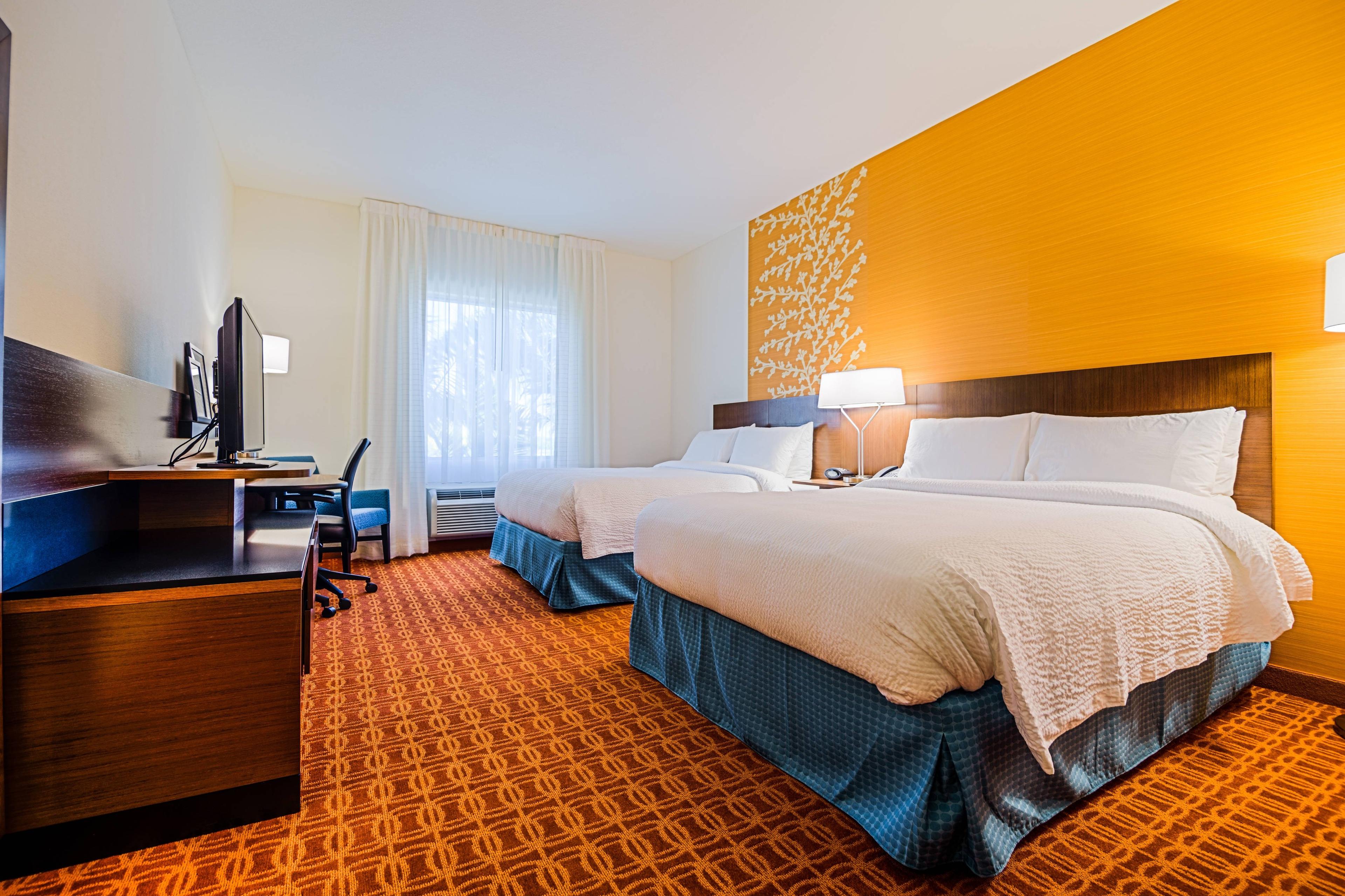 Our queen/queen hotel rooms provide a superior level of comfort with 12-foot ceilings, flat-panel TVs, microwaves and mini-refrigerators, plus coffee and tea makers.