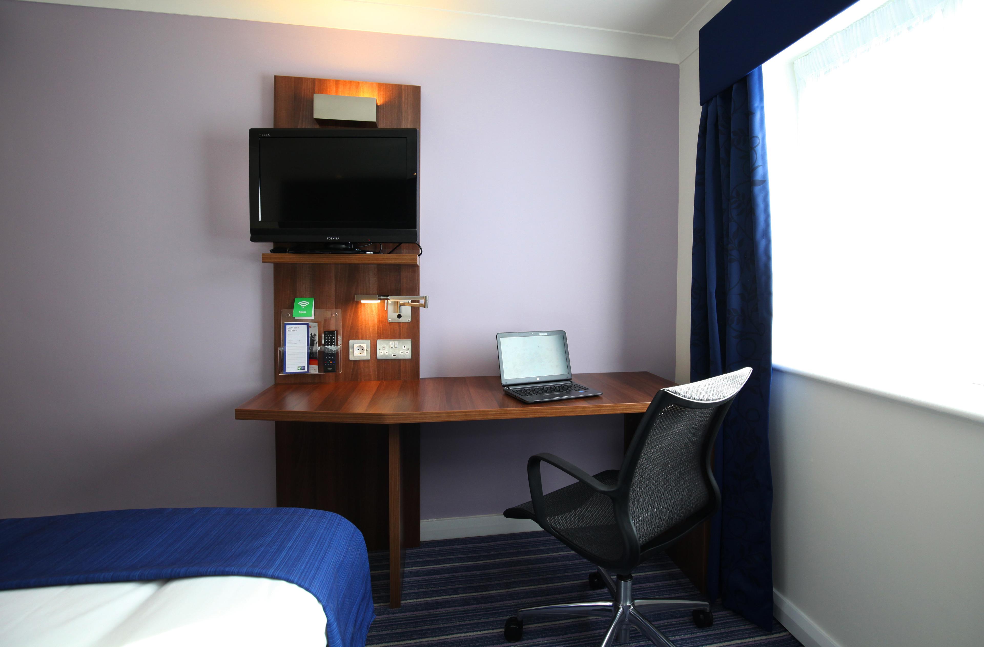 All our guest rooms include a well-lit desk area and free WiFi