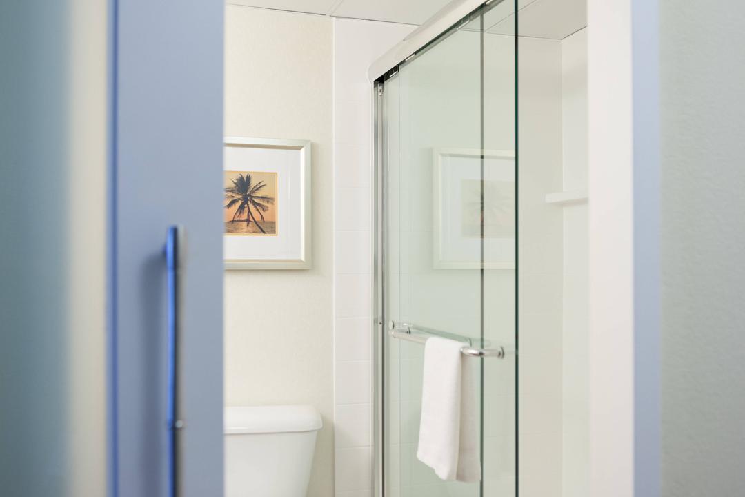 Plush towels and glass-enclosed shower stalls take your stay to the next level. Enjoy everything West Palm Beach has to offer.