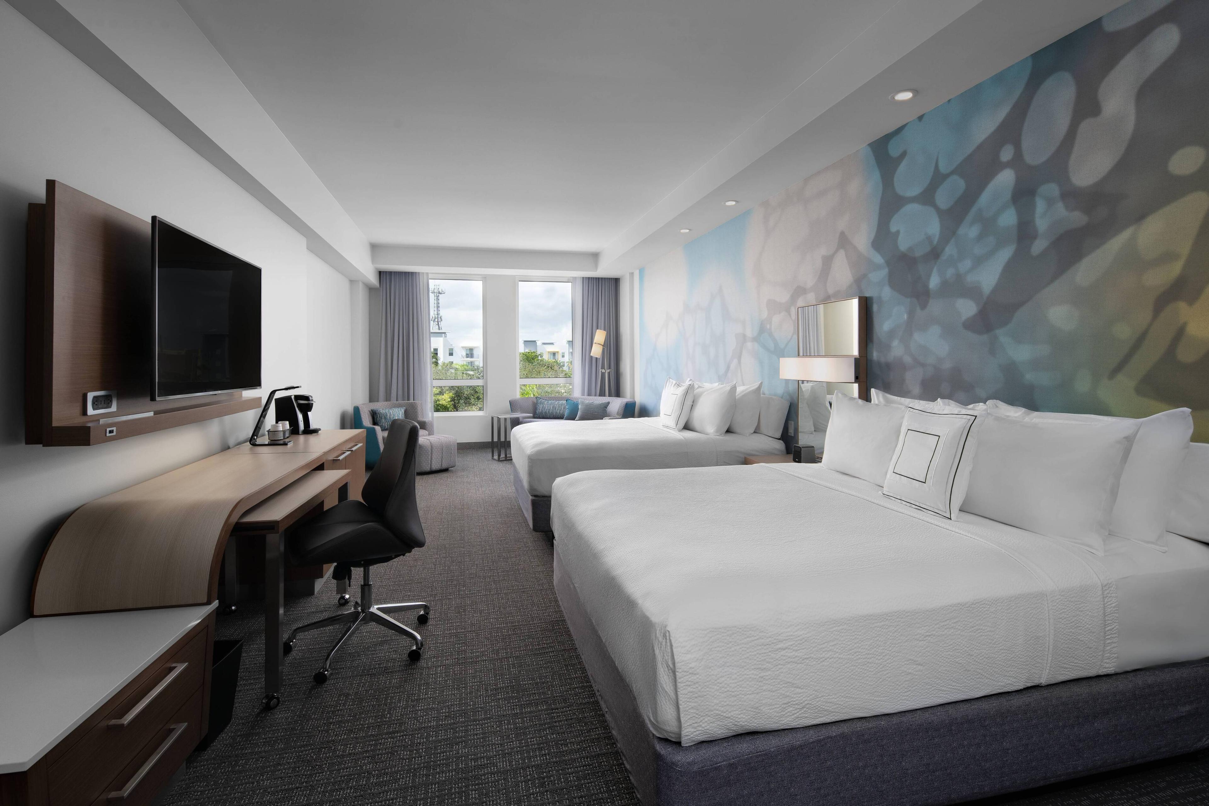 Our spacious guest rooms with two kind beds and sleeper sofa provide comfortable bedding, exciting amenities, and complimentary wireless Internet access.