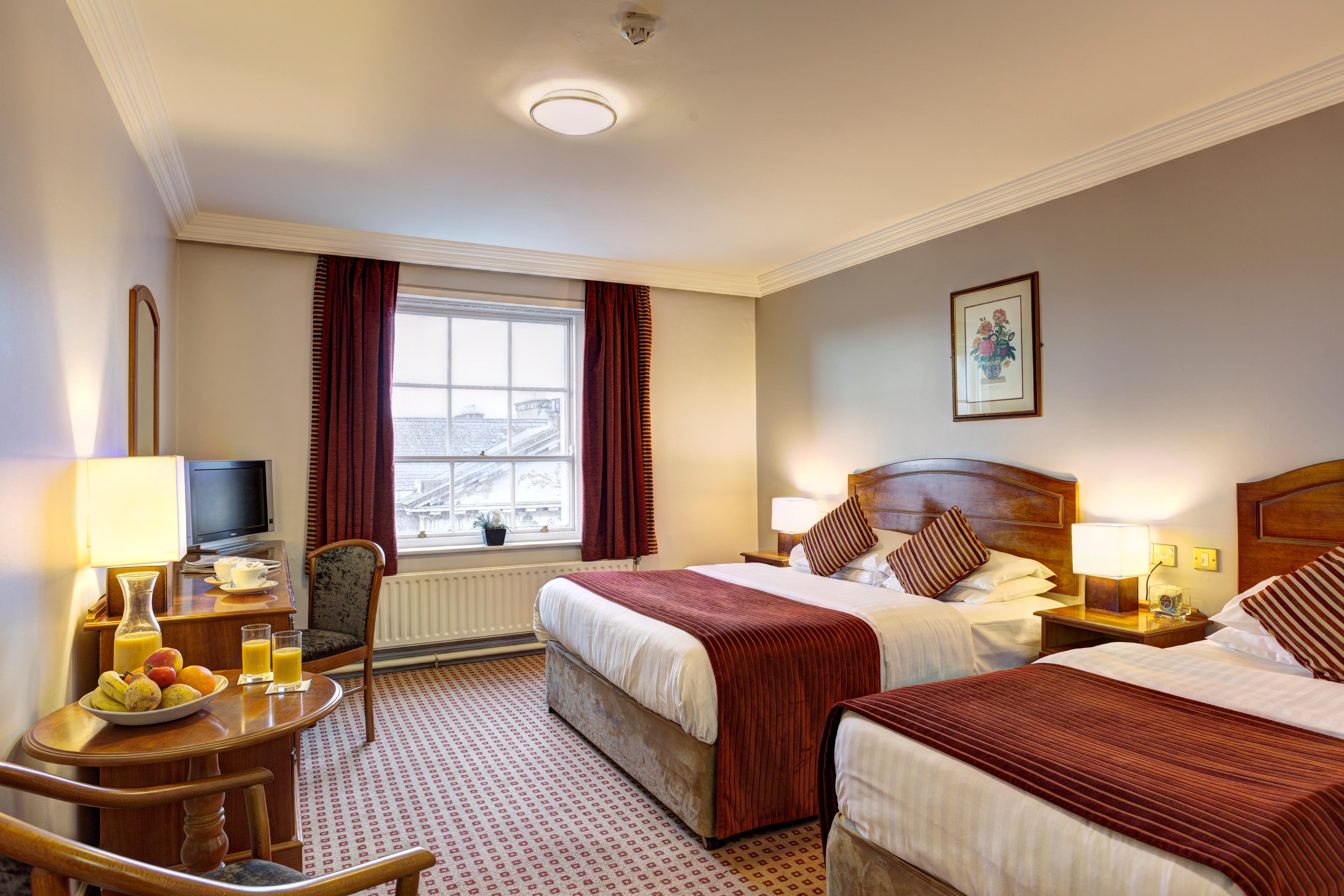 <p>Boasting accommodation for up to three, you can enjoy everything Dublin has to offer with friends, family and loved ones! When you stay in our Triple Room, overlooking Dublin's scenic downtown, you'll also have access to a host of amenities to ensure your stay is as comfortable as it is rewarding. Enjoy:</p><ul><li>Multi-channel flat-screen televisions</li><li>Complimentary in-room coffee and tea</li><li>Free Wi-Fi</li><li>In-room laptop safe</li><li>Electronic key-card access</li><li>Bathroom amenities</li></ul>