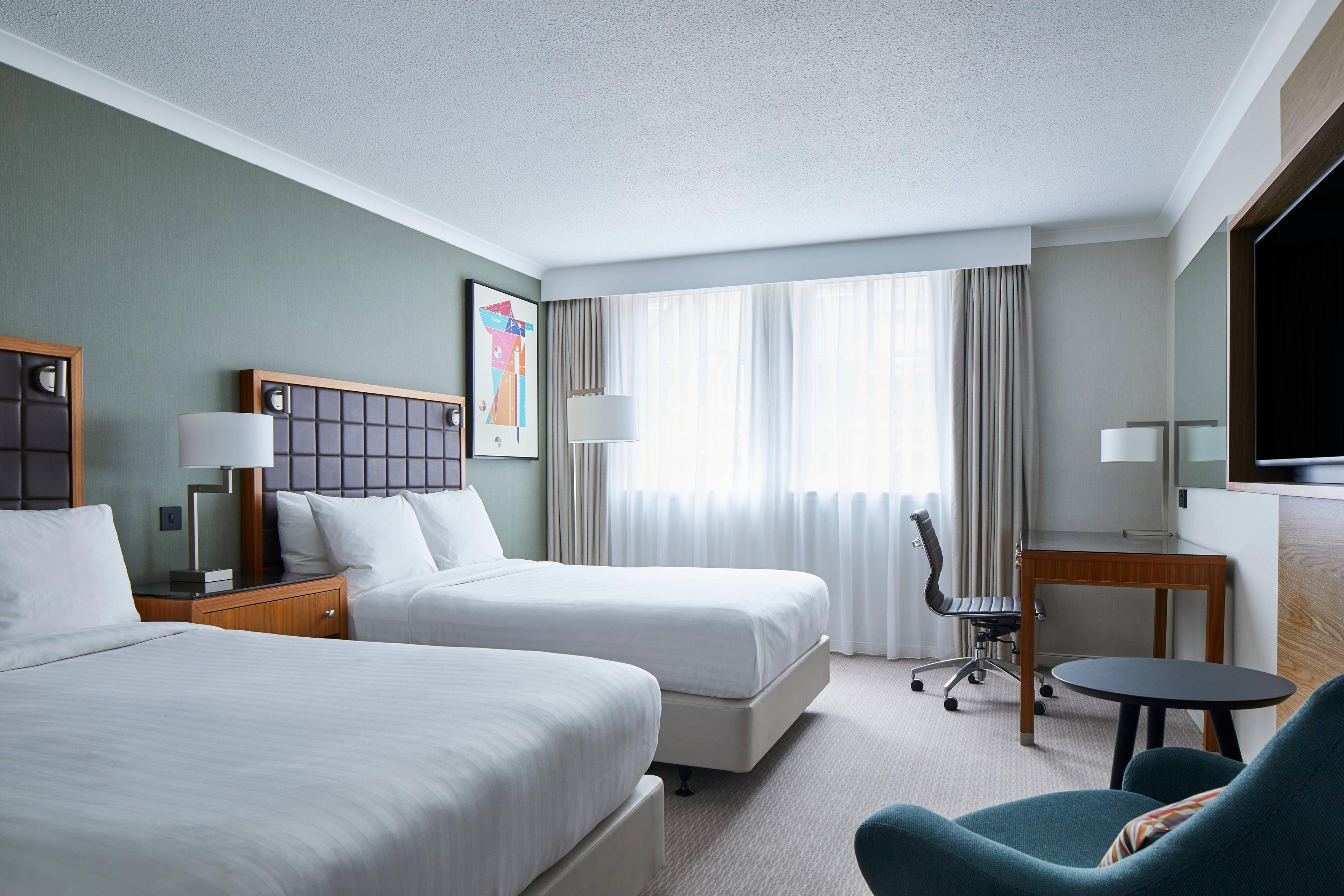 Enjoy plenty of space and comfort in our Deluxe Double/Double guest room with high-speed Wi-Fi access, a coffee and tea maker and a flat-screen TV.
