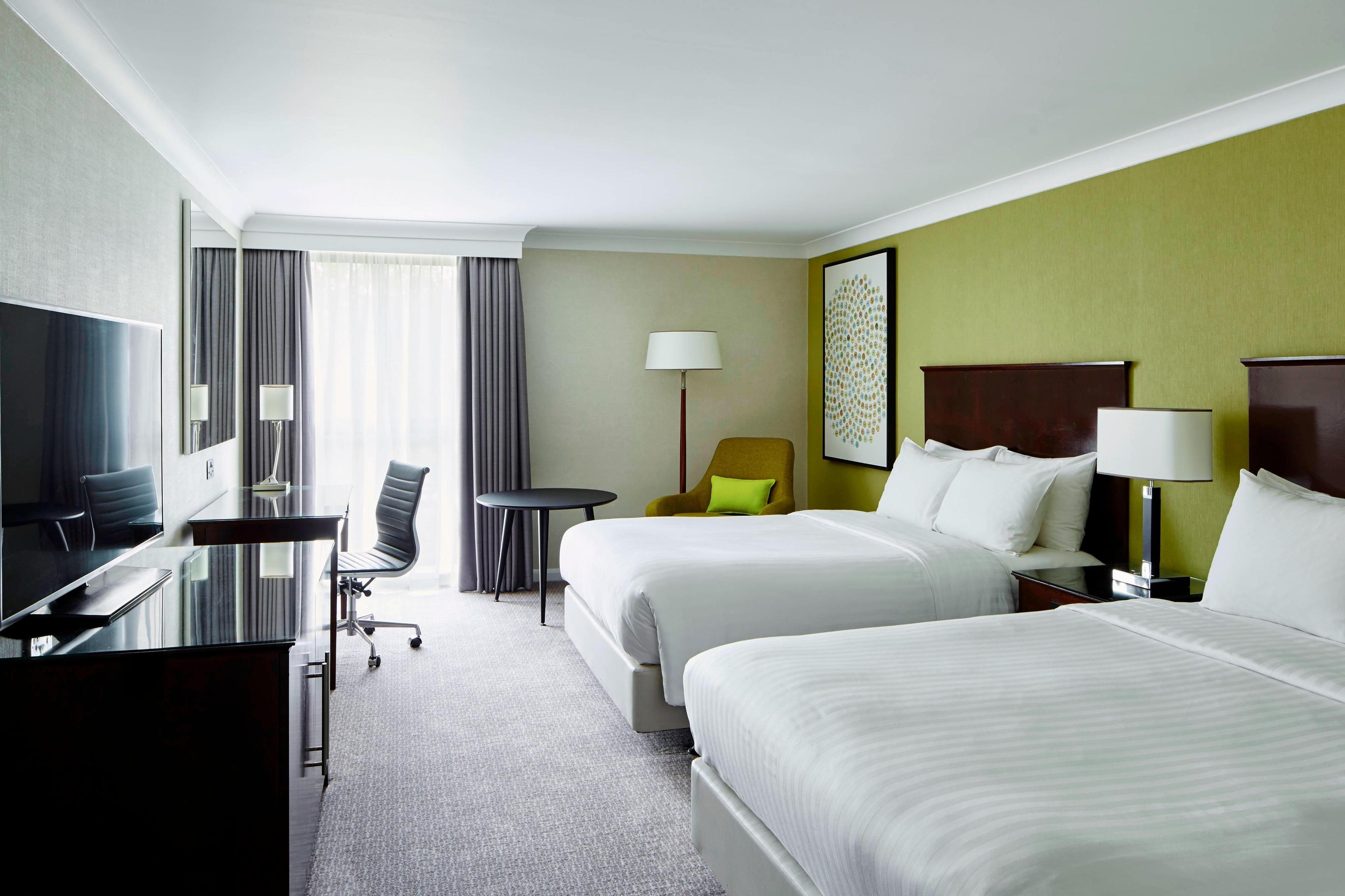 All double/double guest rooms at Manchester Airport Marriott Hotel feature two large double beds, a 49-inch flat screen TV and high-speed Internet access.