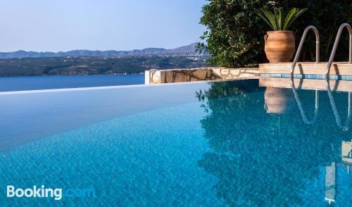 Villa Silvia with heated swimming pool and magnificent sea view in MEGALA KHORAFIA, Greece