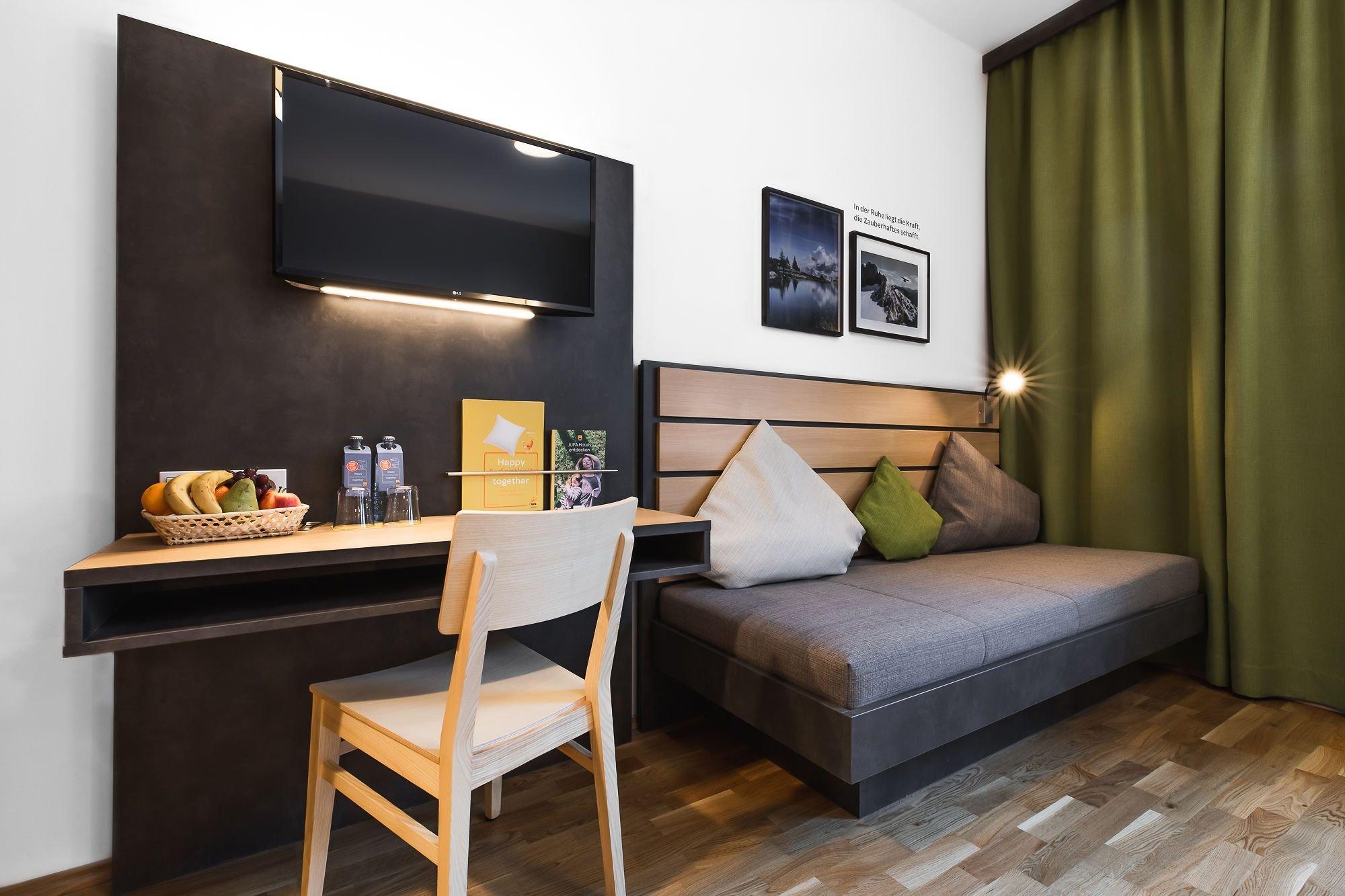 Modern, bright and friendly rooms with normal double bed or comfortable box-spring bed, sofa, shower, WC and hair dryer, TV, free WIFI, safe and folding bench.