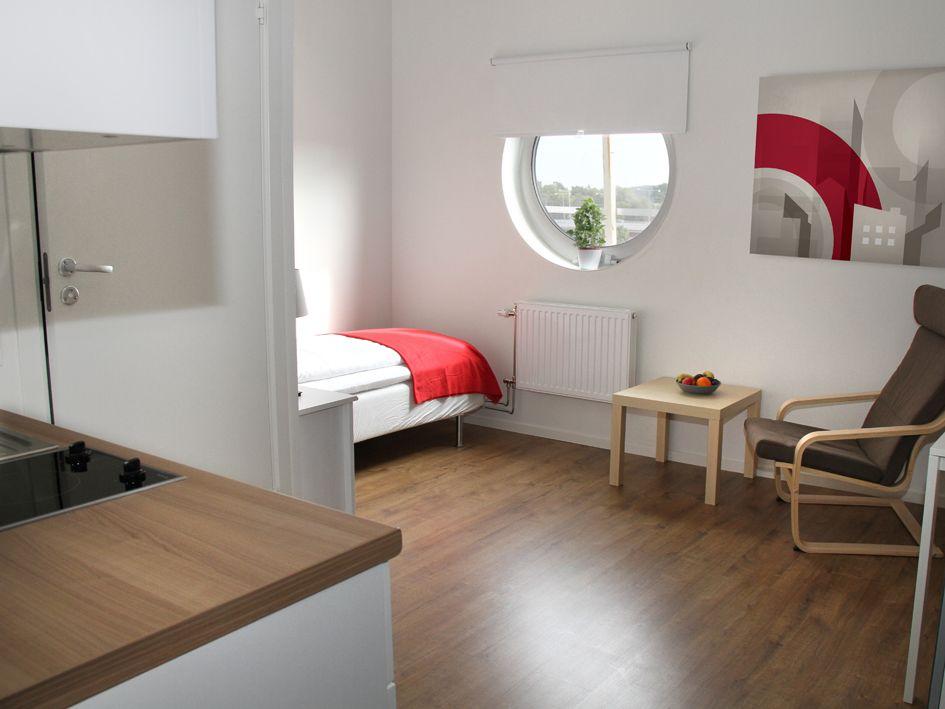 Our studio apartments is 17-19 sqm and has a fully equipped kitchenette with a stove, fridge with freezing compartment, microwave, kettle, dining table with chairs and a separate sitting area. 1 x 90 cm bed with pillow, duvet and bedlinnen. Bathroom with a shower and towels. Free Wi-Fi and Smart-Tv in every apartment and wardrobe with mirror door. Laundry room with iron and ironing boards and garbage room on each floor. Free access to the gym Puls & Traning.