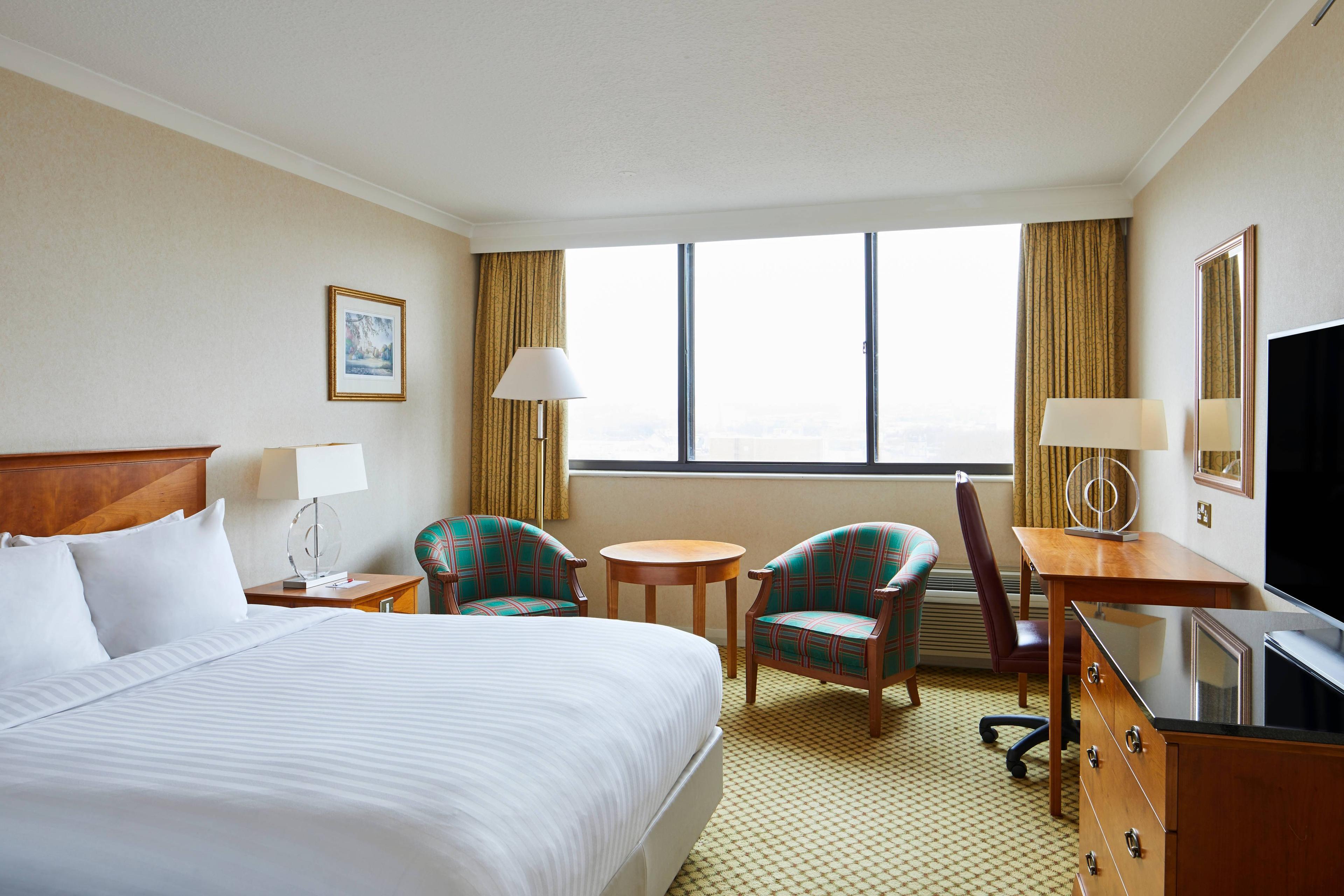 We offer room service and premium bath products in our double deluxe guest room.