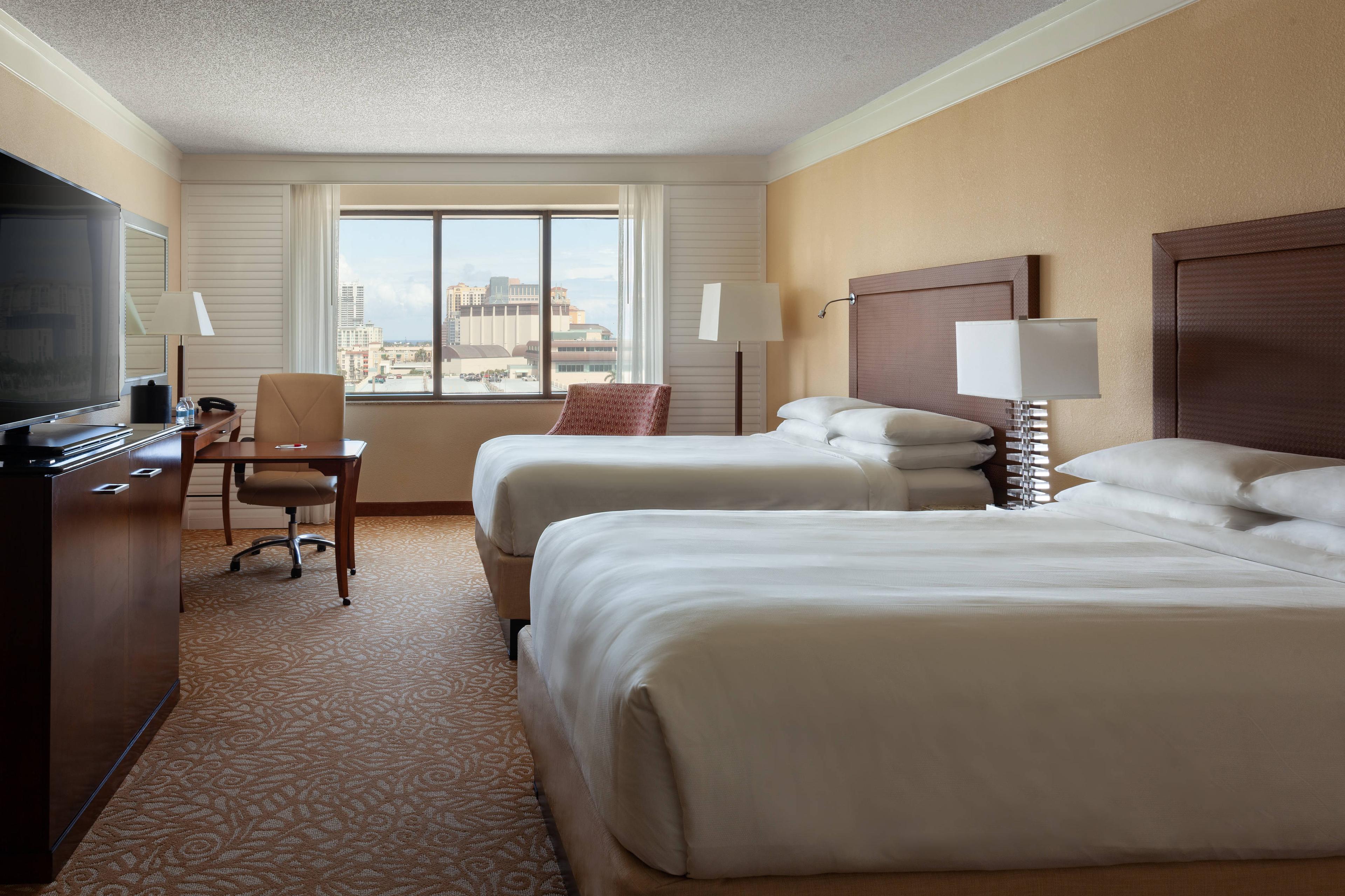 Double/double guest rooms feature plush beds, mini refrigerators, large flat-screen TVs and great city views.