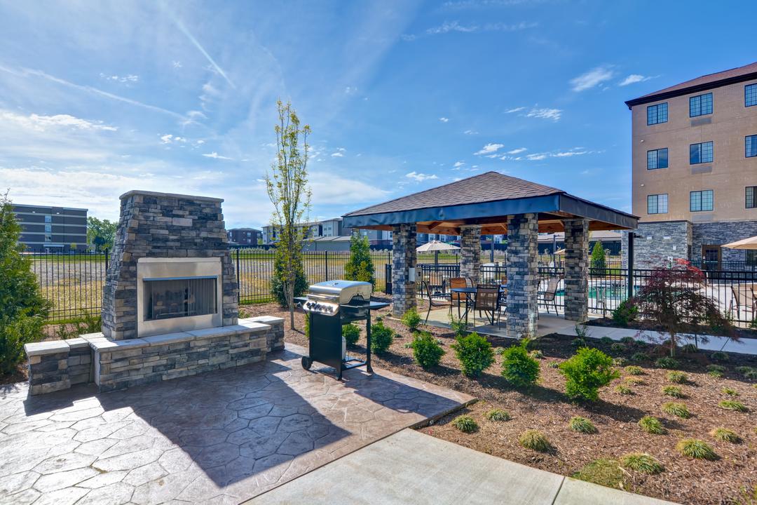 Enjoy the firepit & grills on the outdoor patio Staybridge Suites