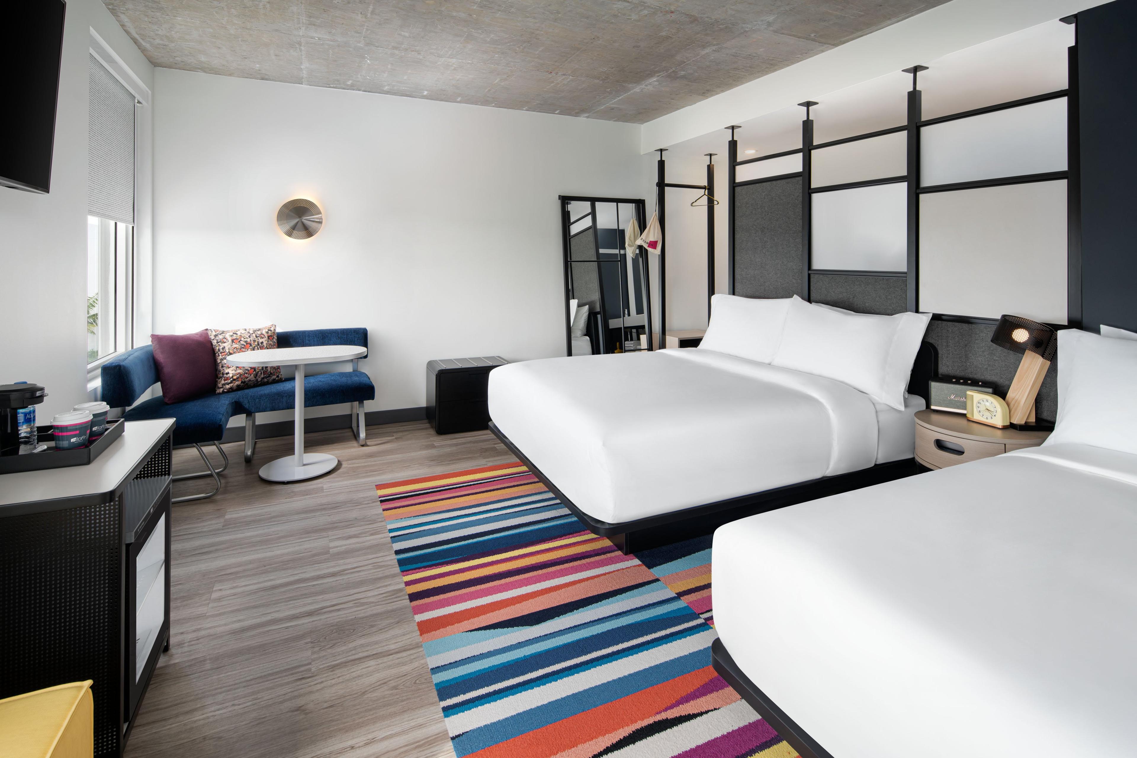 Breeze into one of our Aloft rooms, featuring our ultra-comfortable signature bed, walk-in shower, custom amenities by Bliss® Spa, and more.