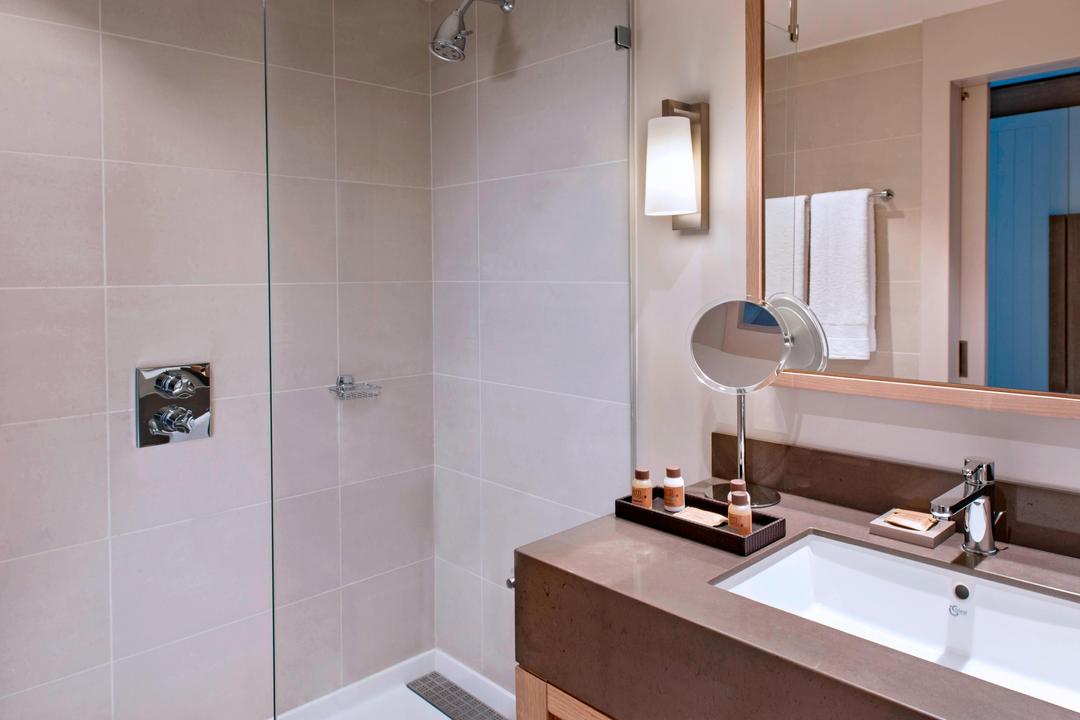 Pamper yourself in our spa-like guest bathrooms featuring spacious vanities, large walk-in showers and complimentary travel-sized toiletries.
