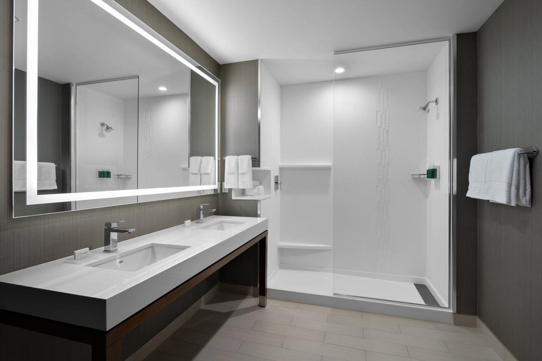 Boasting walk-in showers, free bath products and plenty of counter space to put your cosmetics or toiletries, our bathrooms are the ideal spot to freshen up before an eventful day.