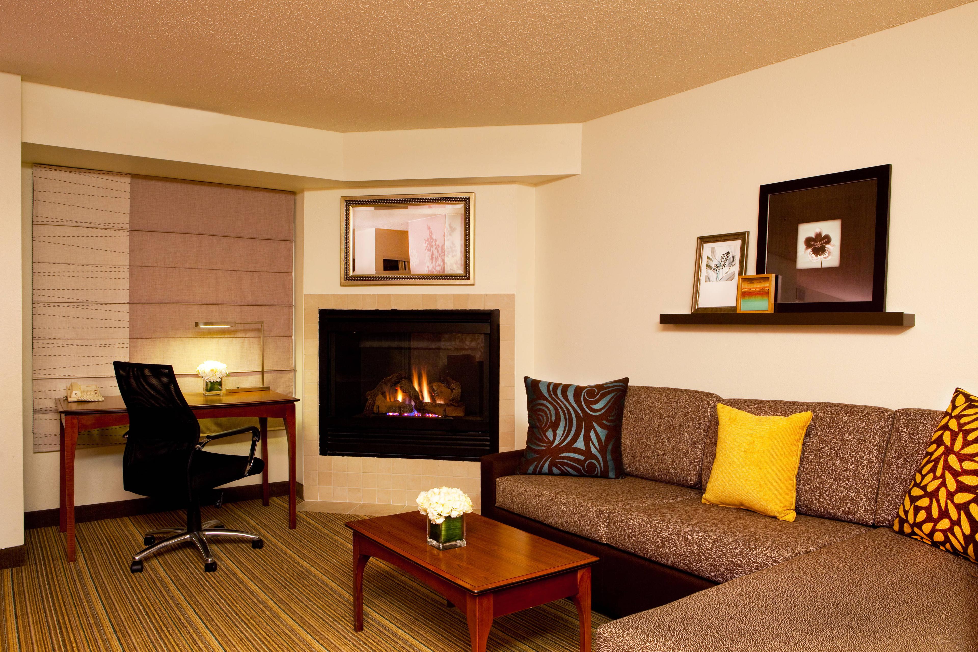 Our Greenbelt hotel's Studio Suites feature a spacious living area, and some have a cozy fireplace.