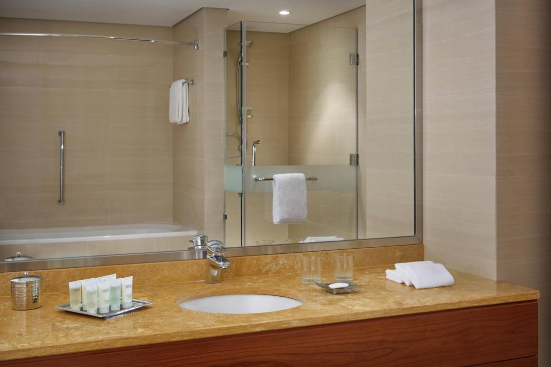 The Courtyard Kuwait Suites have a separate walk-in shower and bathtub in addition to a wide range of luxurious bath amenities.