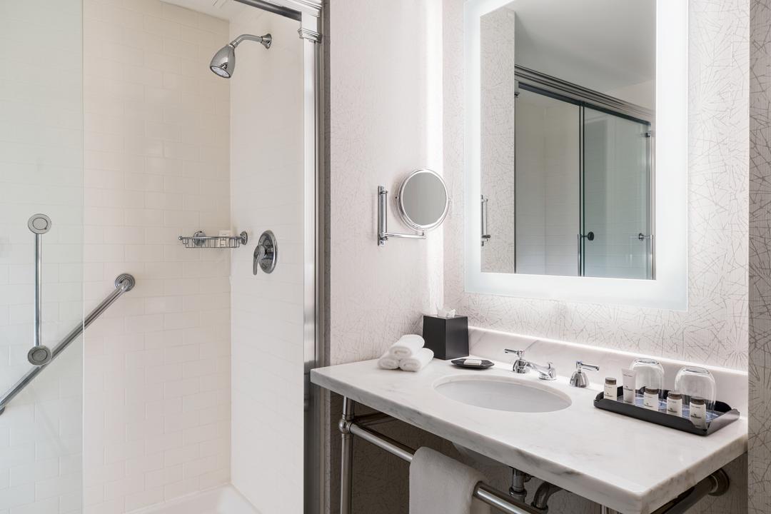 Sleek and inviting, our bathrooms offer glass-enclosed showers, brightly lit mirrors and spacious vanity counter-tops.