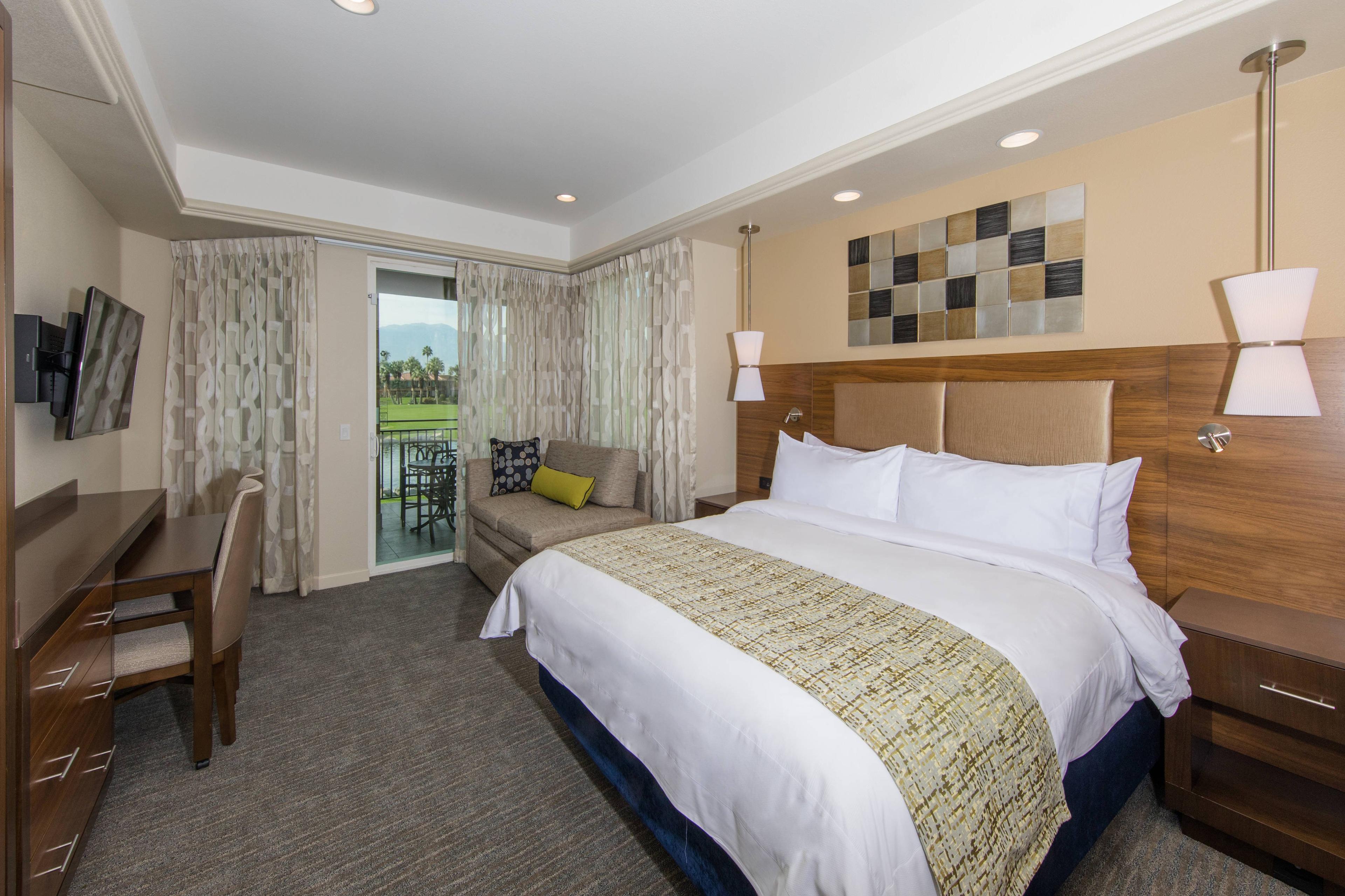 Feel at home during your Palm Desert vacation in these well-designed rooms, which open onto a furnished patio or balcony.