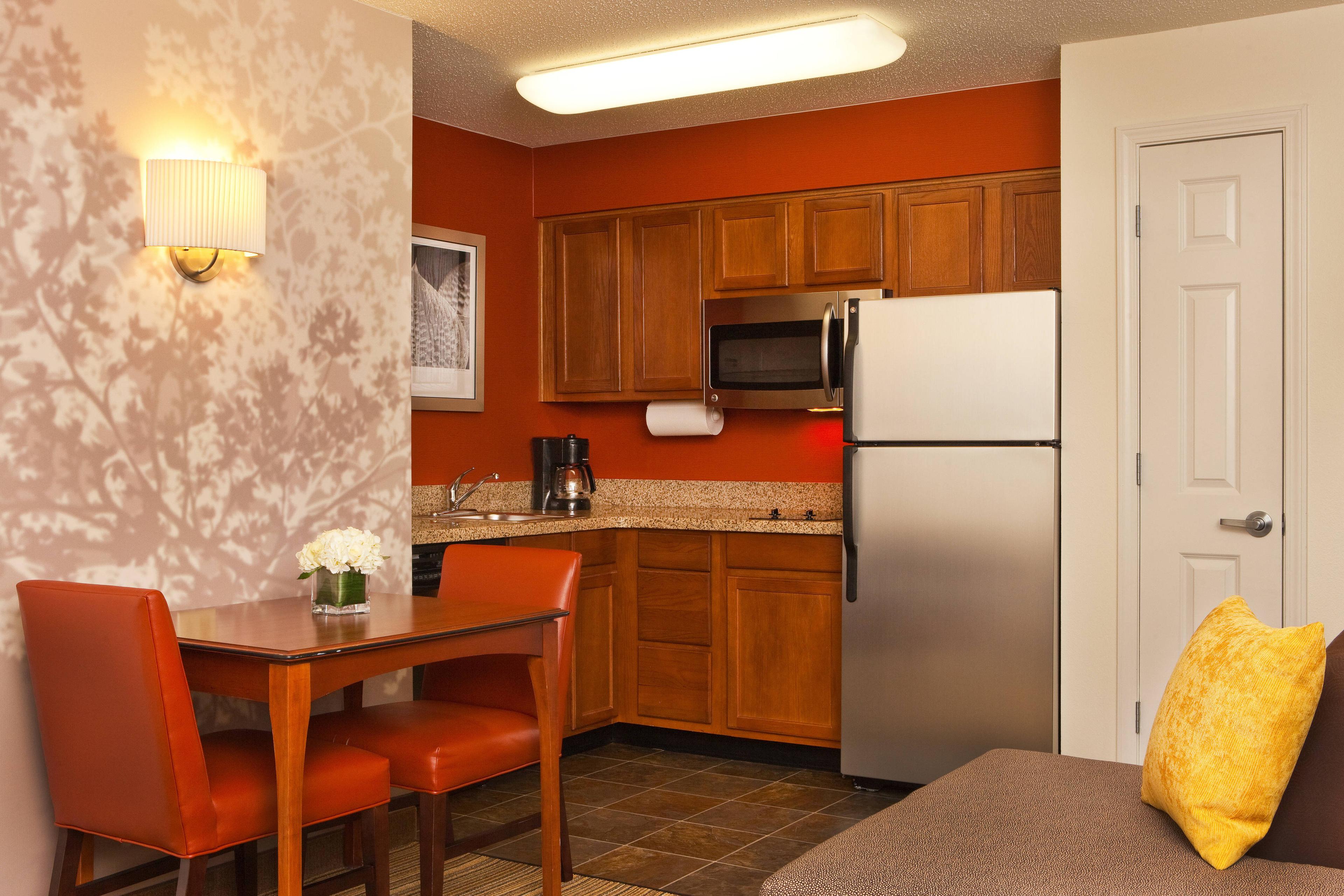 Our Greenbelt hotel's One-Bedroom Suite features a fully equipped kitchen and dining area for two.