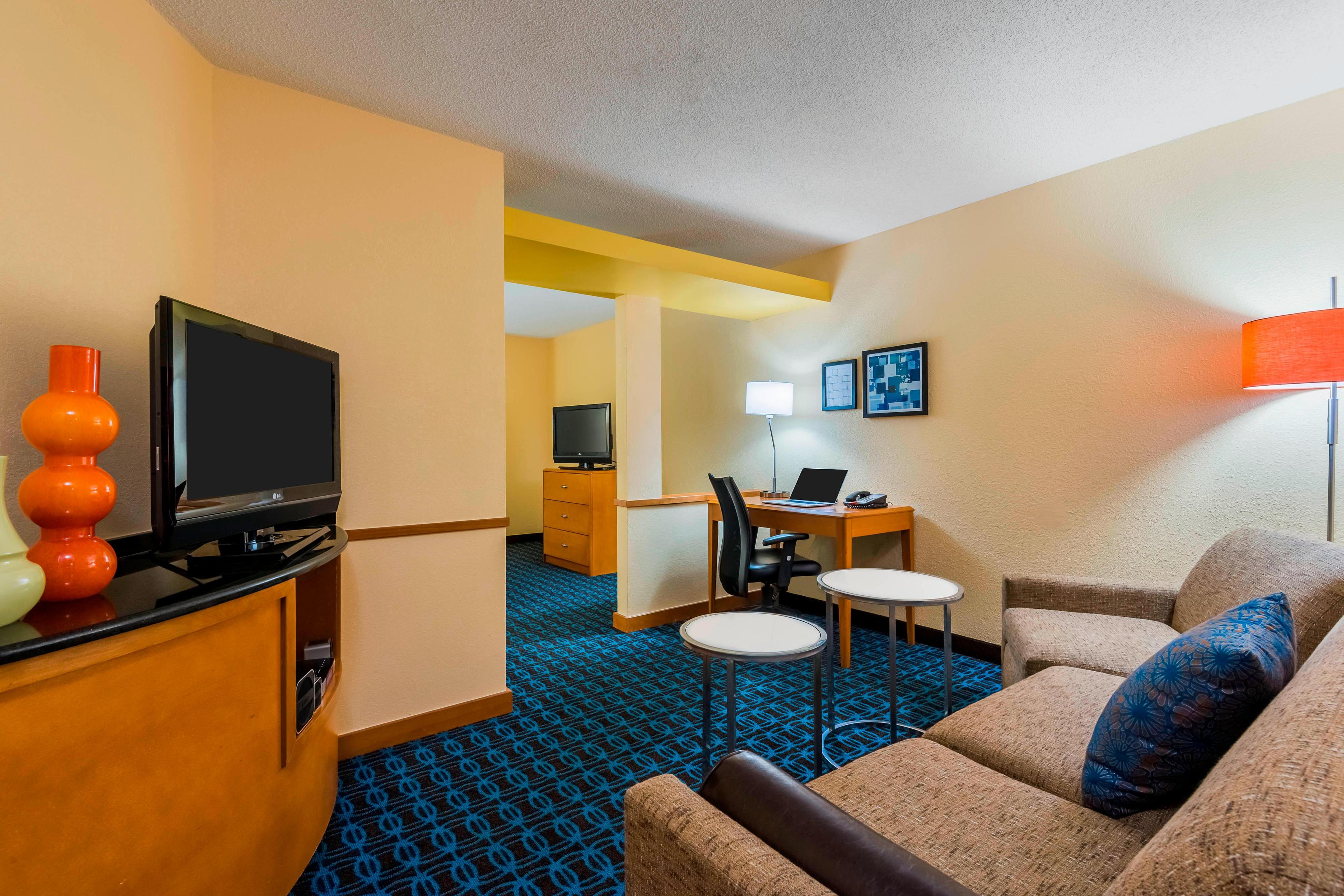 Experience one of our King Suites during your stay! This spacious King Suite offers all the conveniences of home, including a separate area for sleeping and living. Take advantage of the complimentary high-speed Internet access and enjoy the flat panel HDTVs!