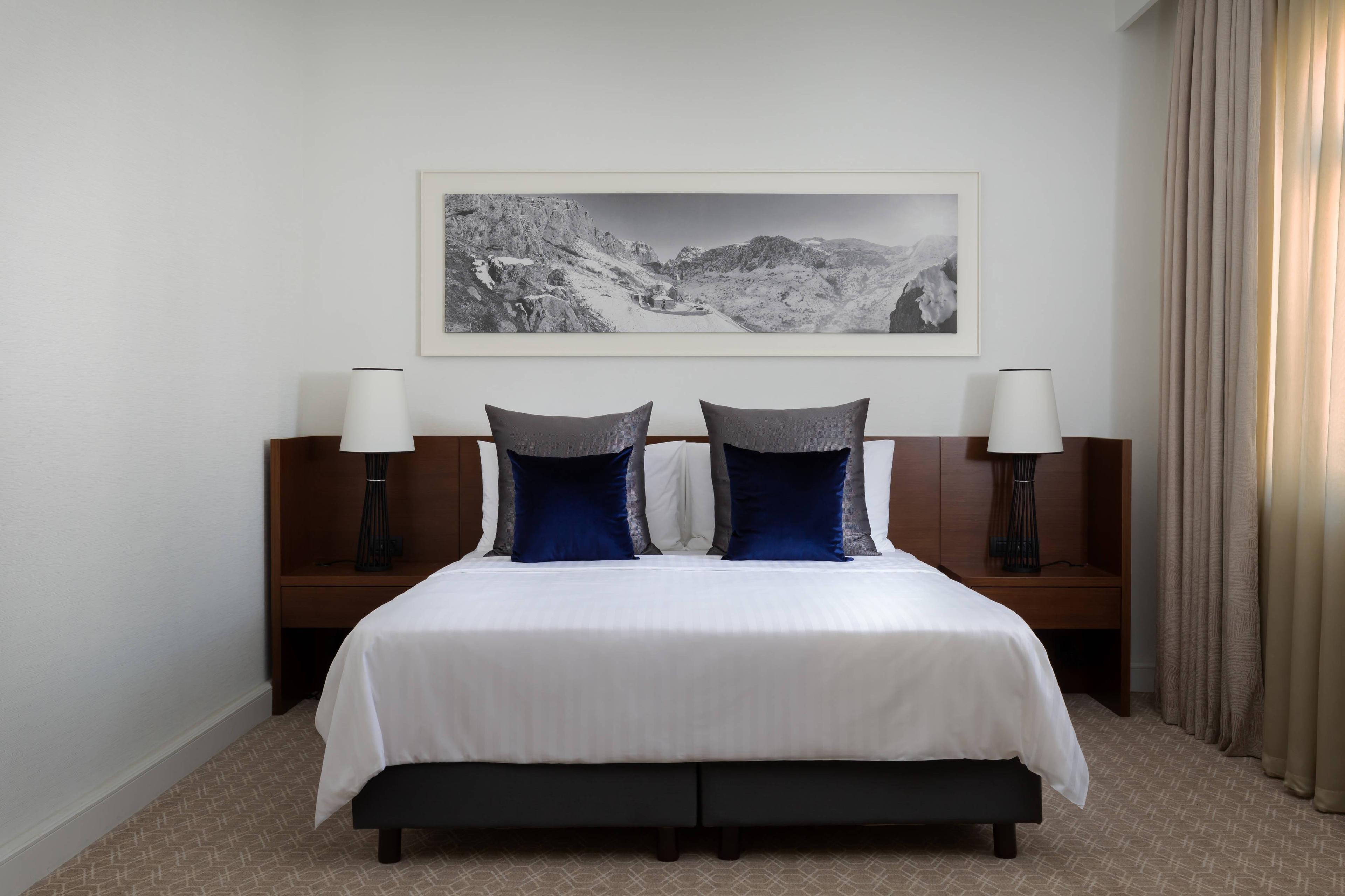 Enjoy the spacious accommodations of our guests rooms with a king-size bed.