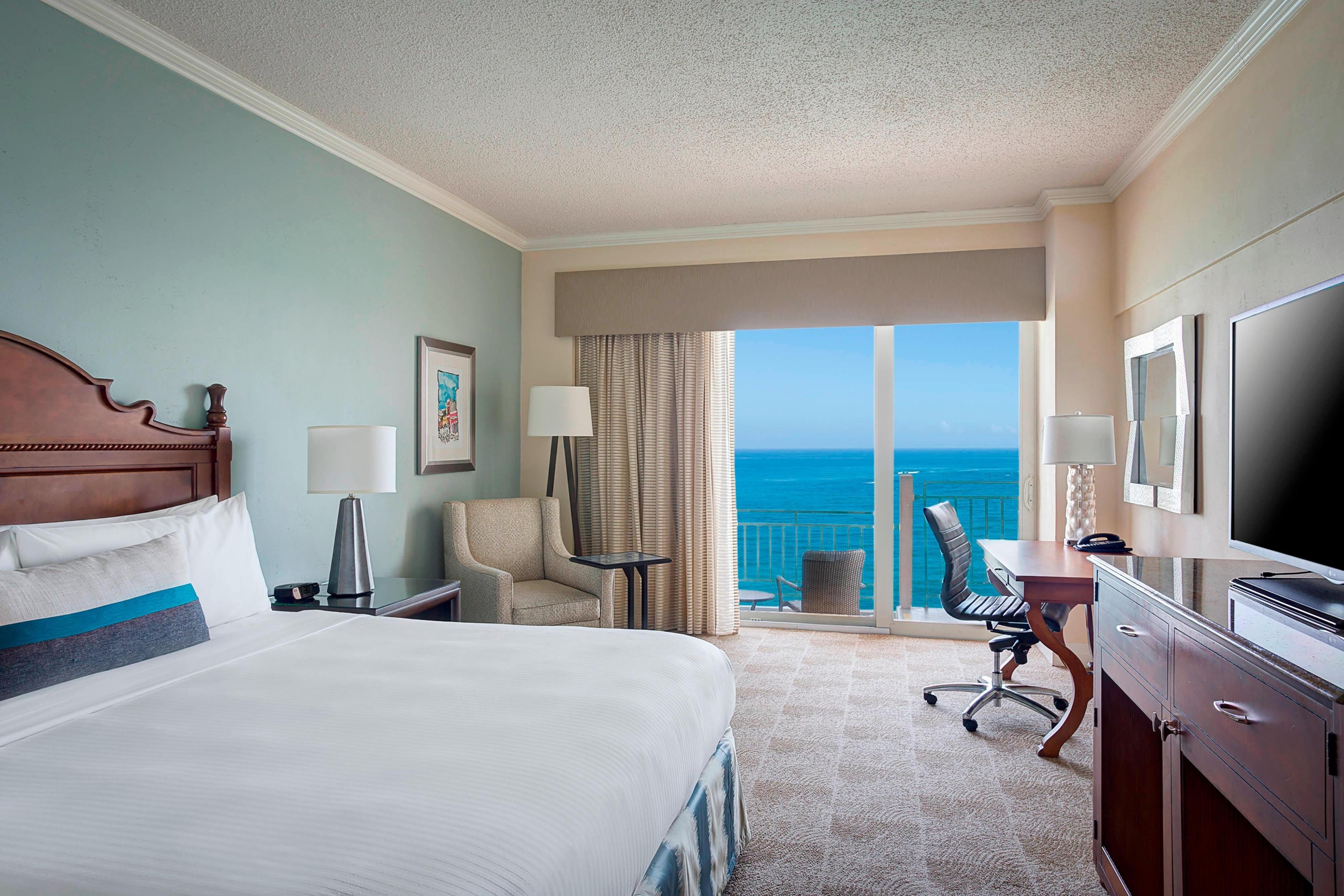 Spacious king-size beds offer the ultimate retreat for a sound night’s sleep with 300-thread-count linens and luxurious down comforters - the perfect hotel room for comfort on your San Juan getaway.