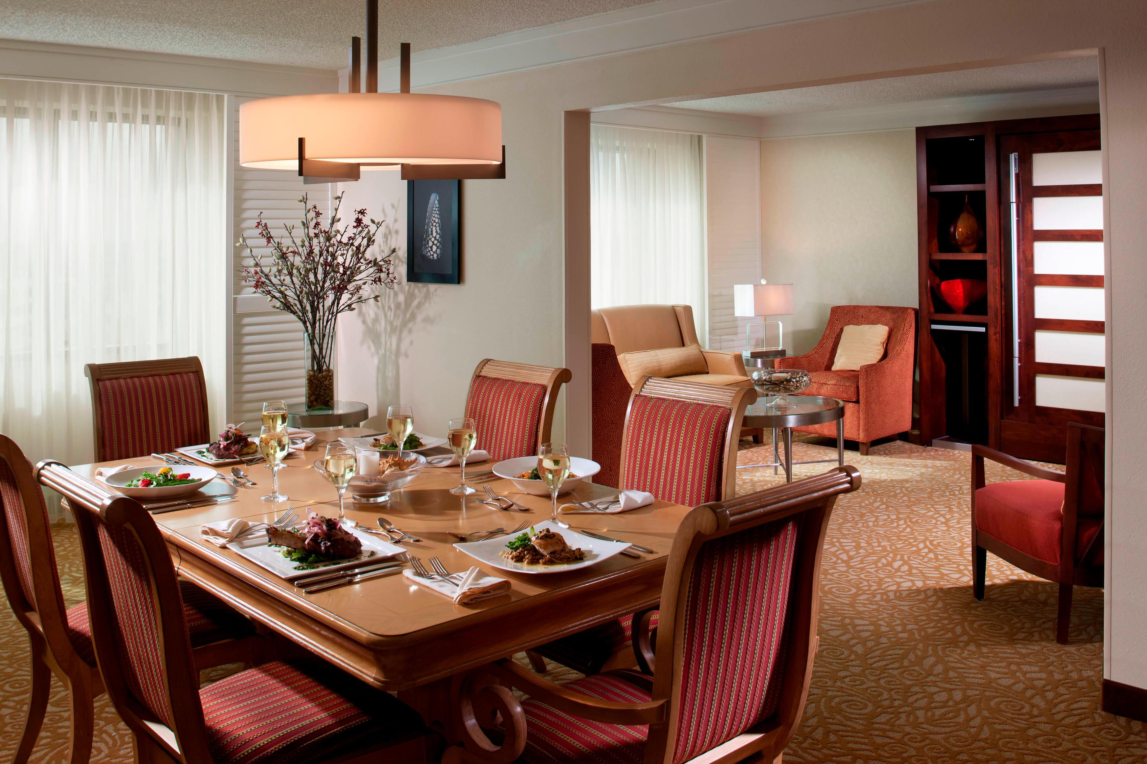 Stay in style in the Presidential Suite, which includes a spacious dining room perfect for entertaining.